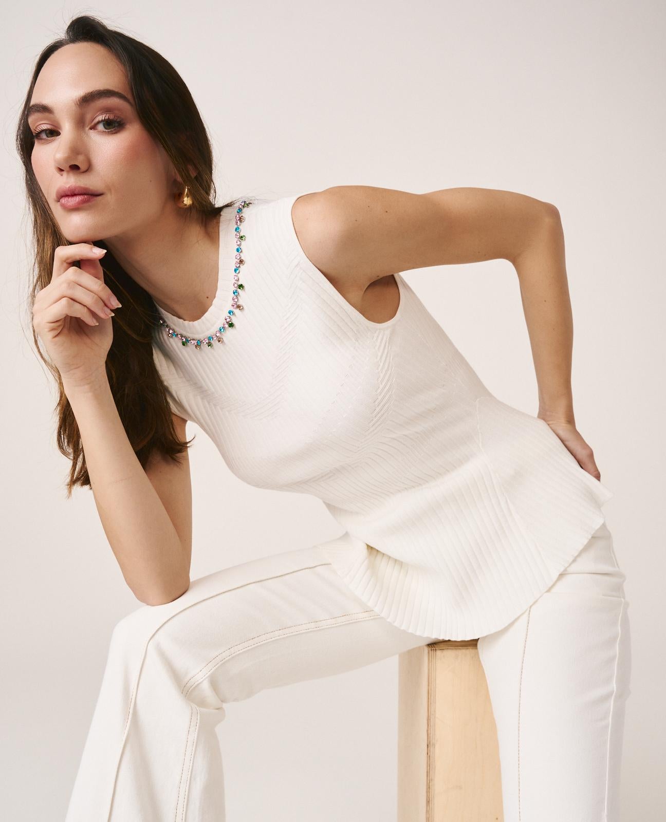 TOP COM CORTE PEPLUM