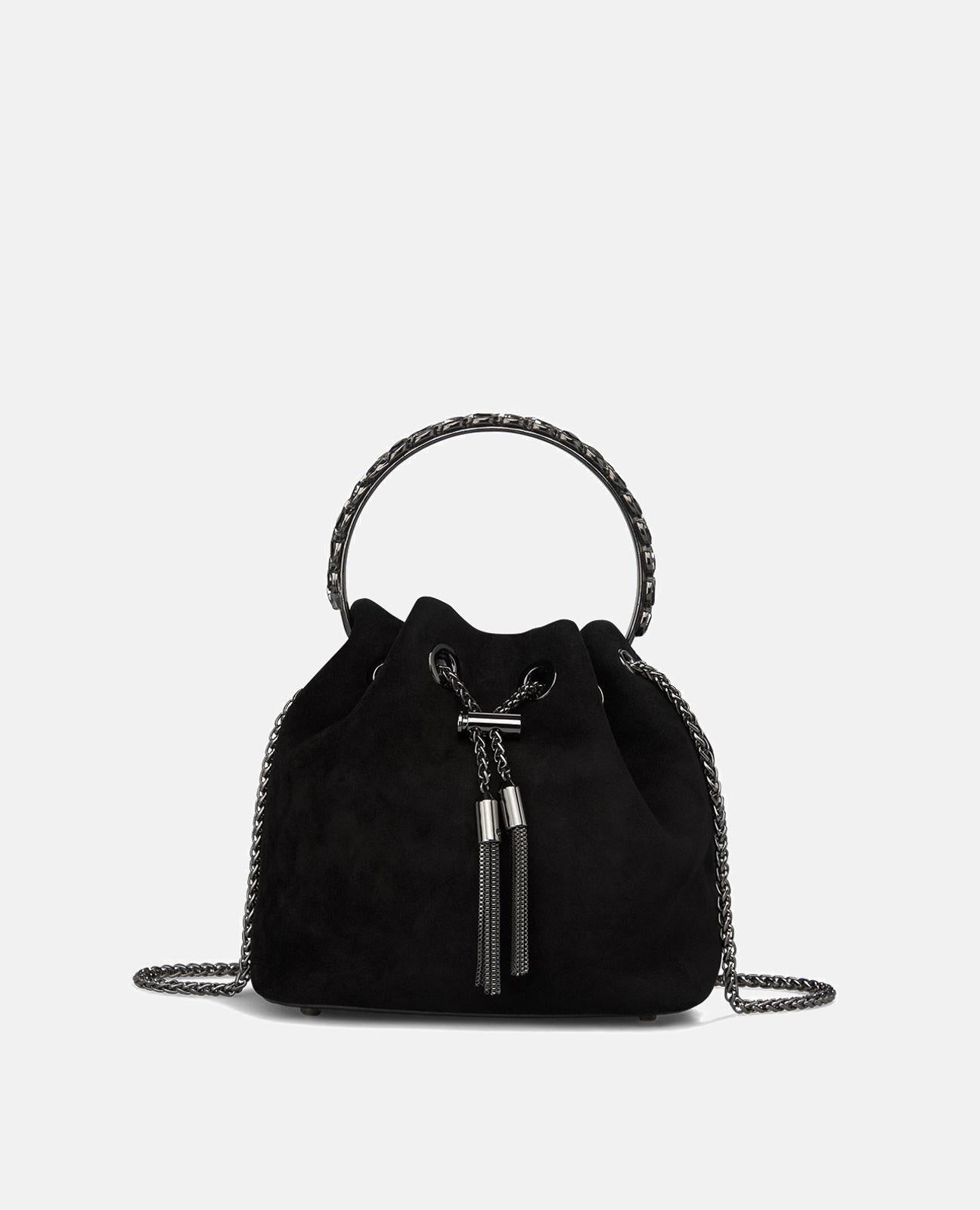 SACO COM PENDENTE E PORMENOR DE PINGENTE