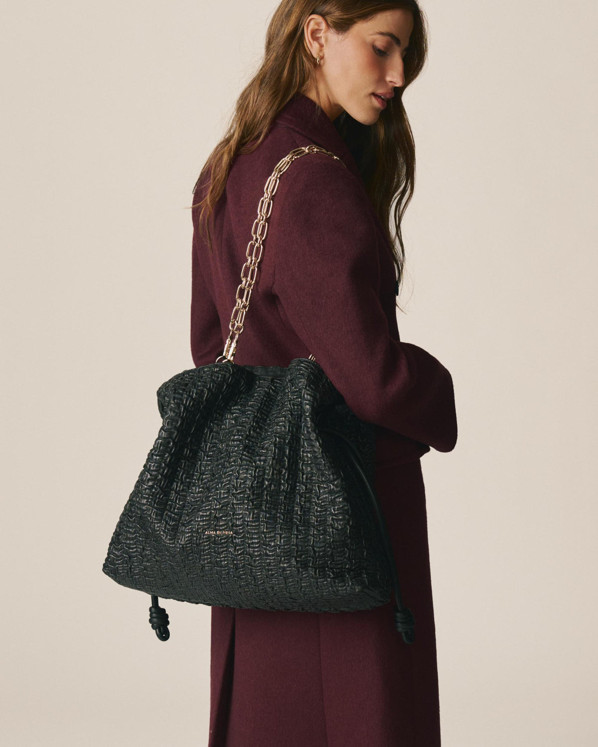 BORSA A FORMA DI CONFETTI IN PELLE STRUTTURATA