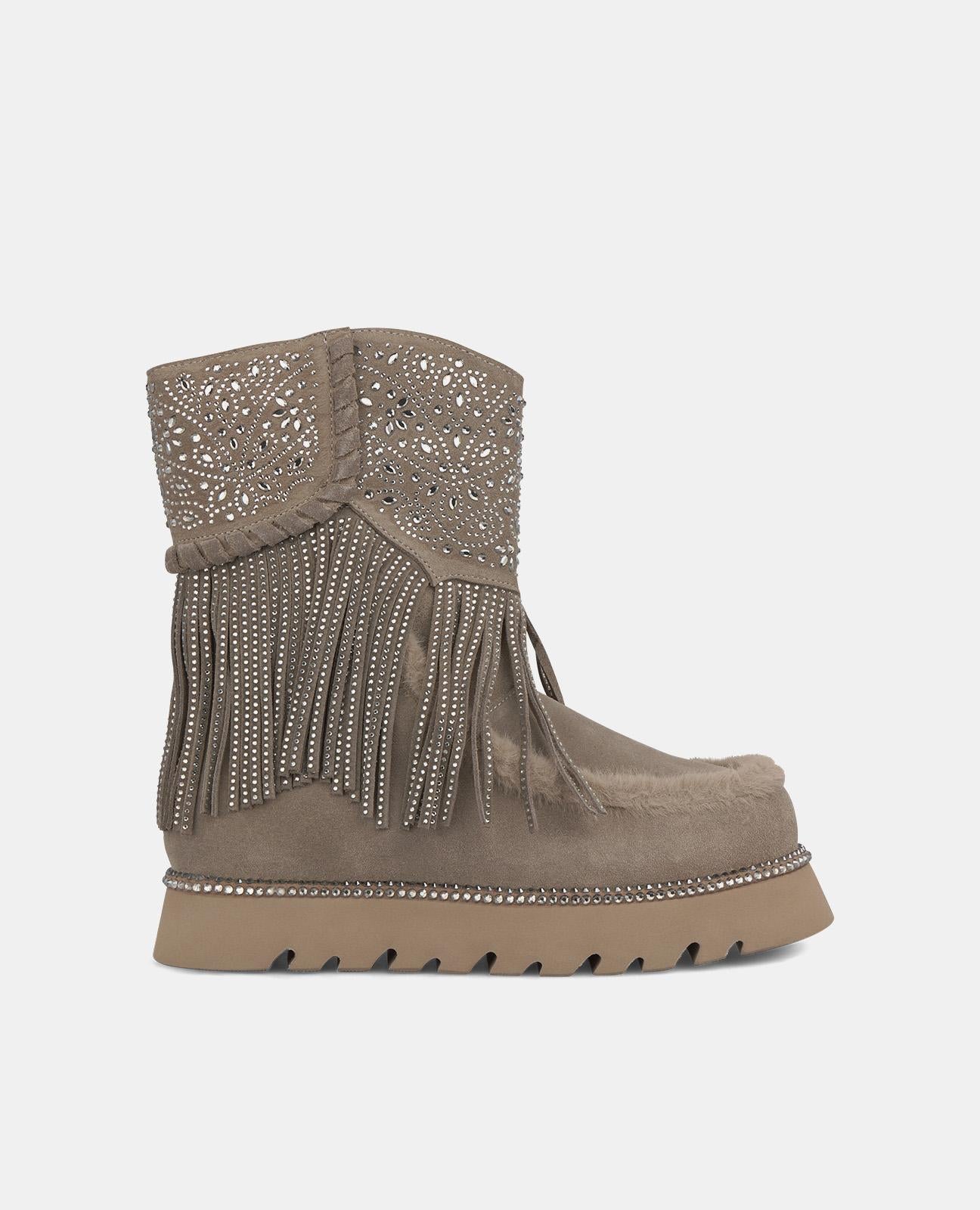 BOTTINES EN FOURRURE AVEC FRANGES