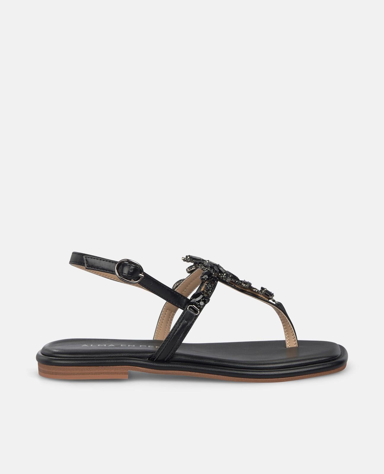 SANDALIA PLANA EN T TIRA EN PEDRERIA