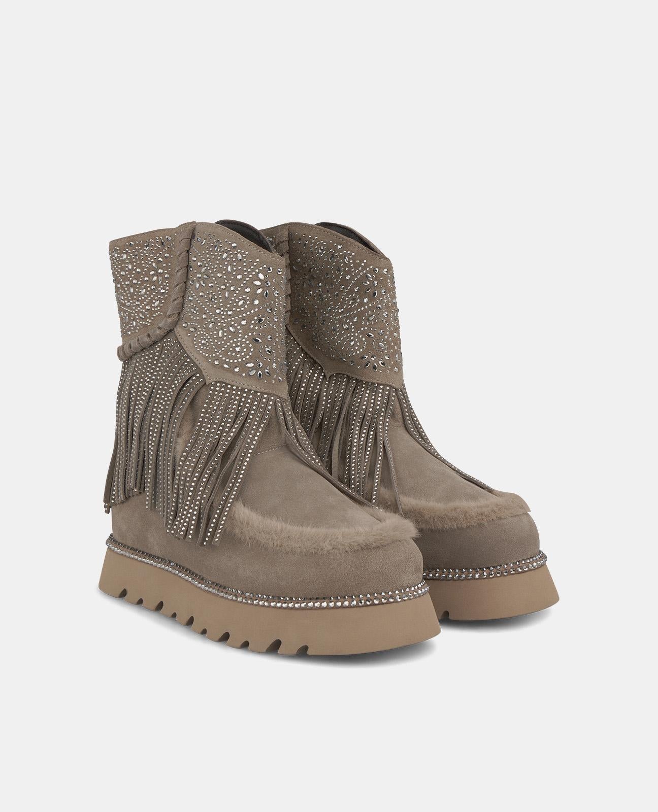 BOTTINES EN FOURRURE AVEC FRANGES