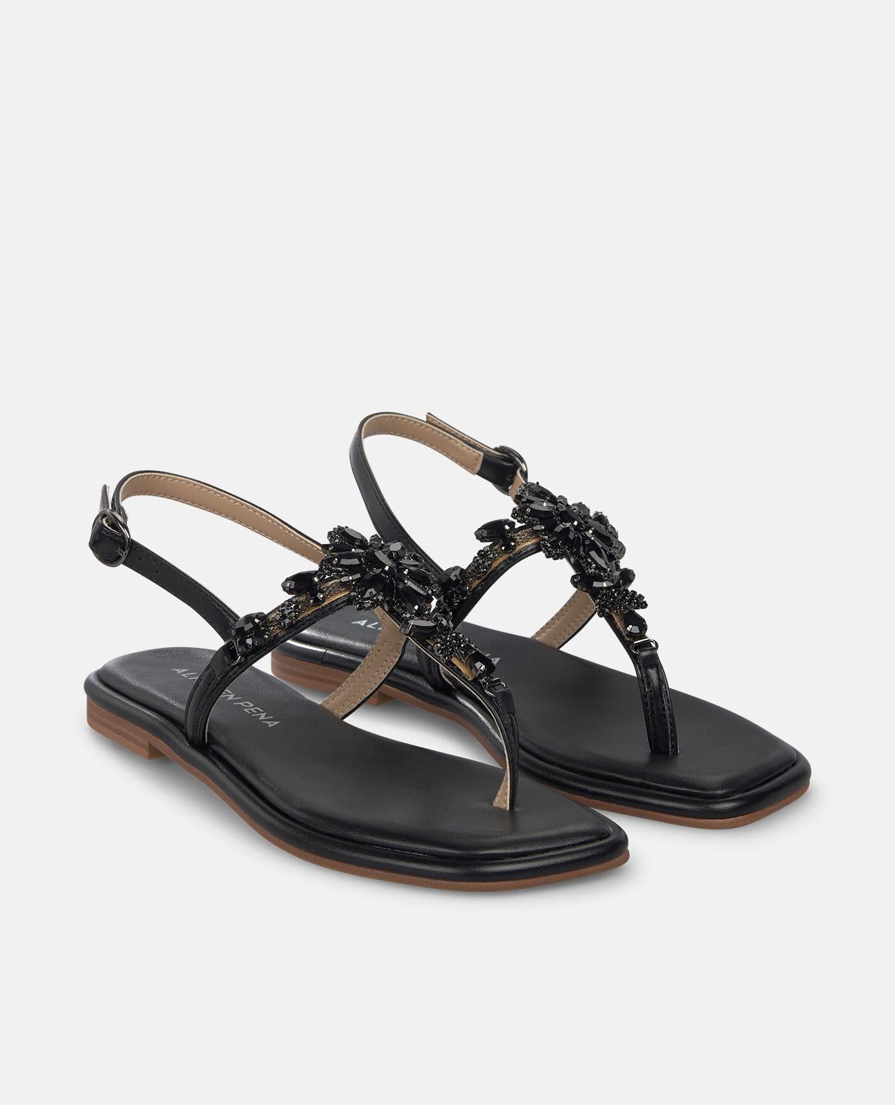 SANDALIA PLANA EN T TIRA EN PEDRERIA