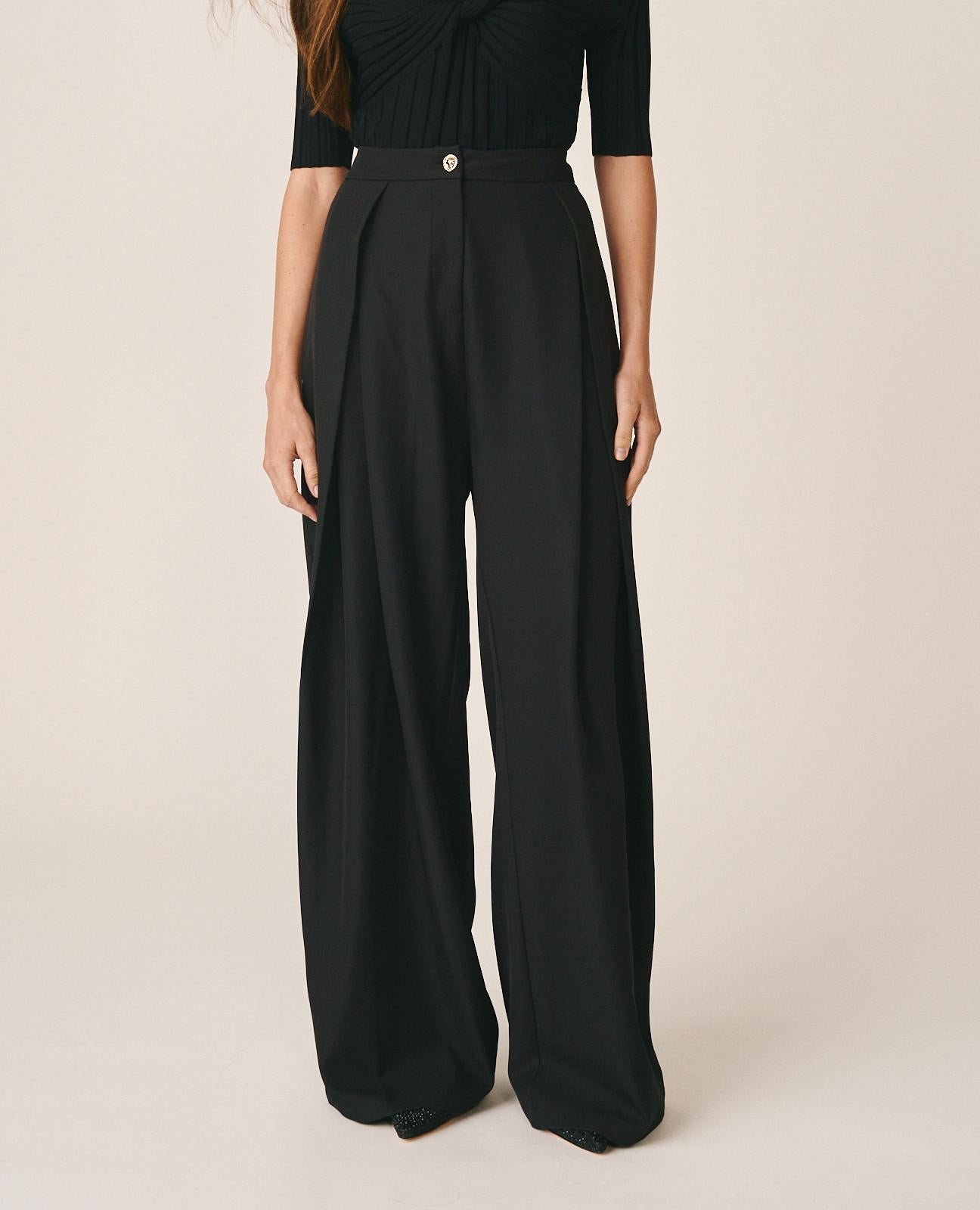 PANTALÓN SARGA CON PINZAS