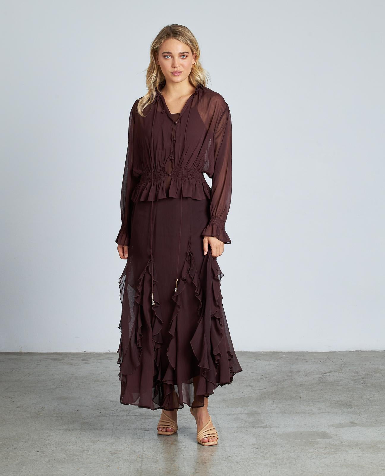 BLUSA SEMITRANSPARENTE VOLANTES