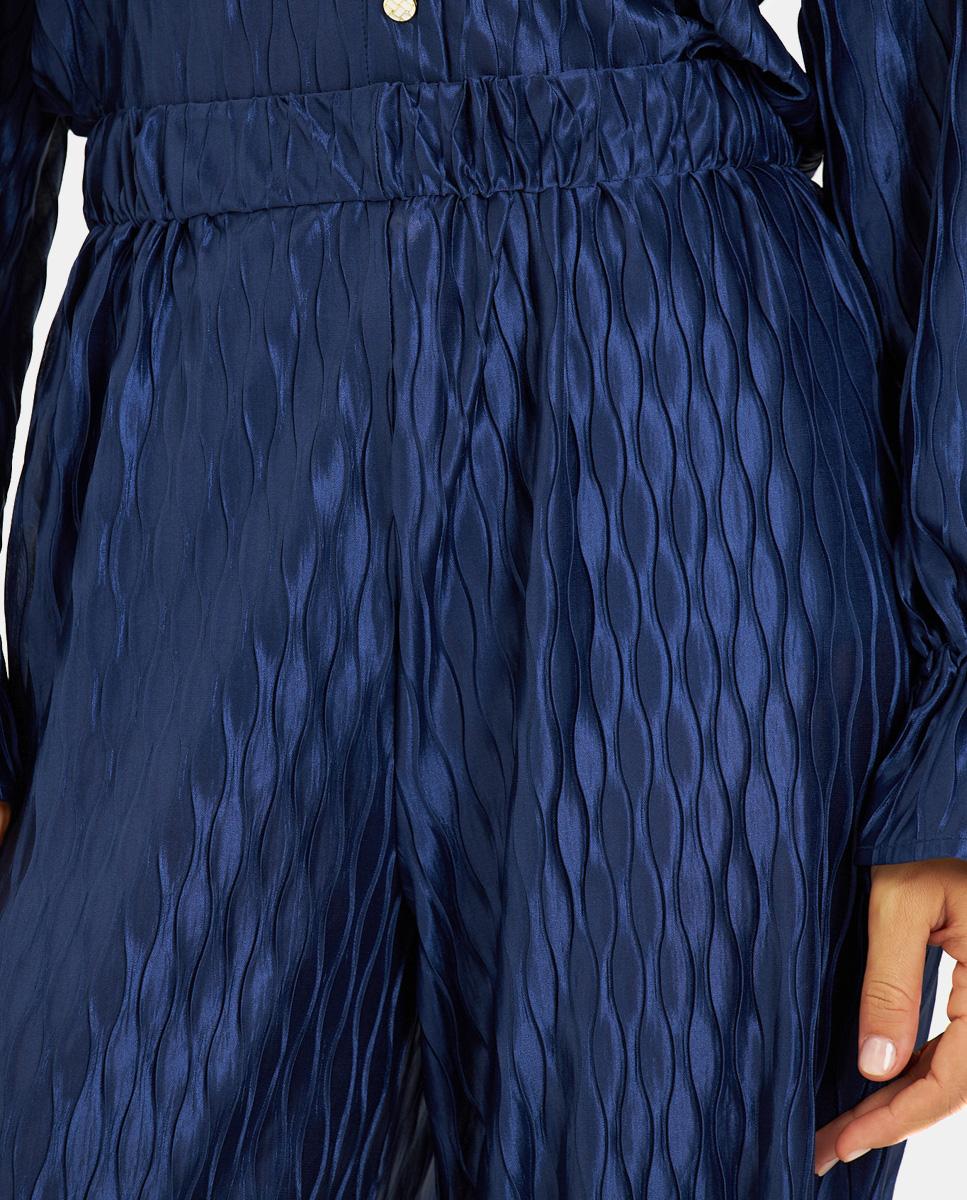 CALÇAS FLUIDAS TEXTURADAS