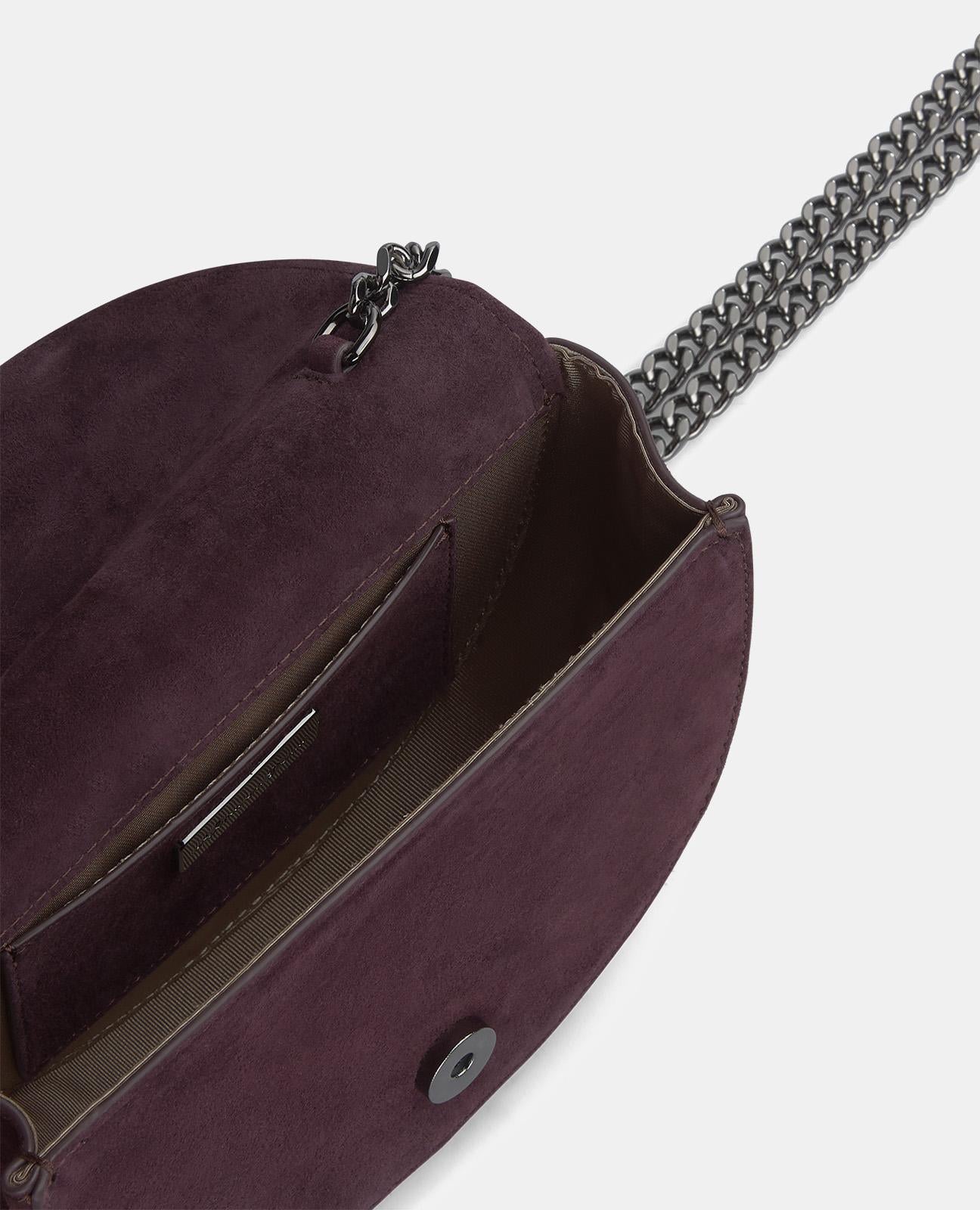 BOLSA DE MÃO DE SERPENTE