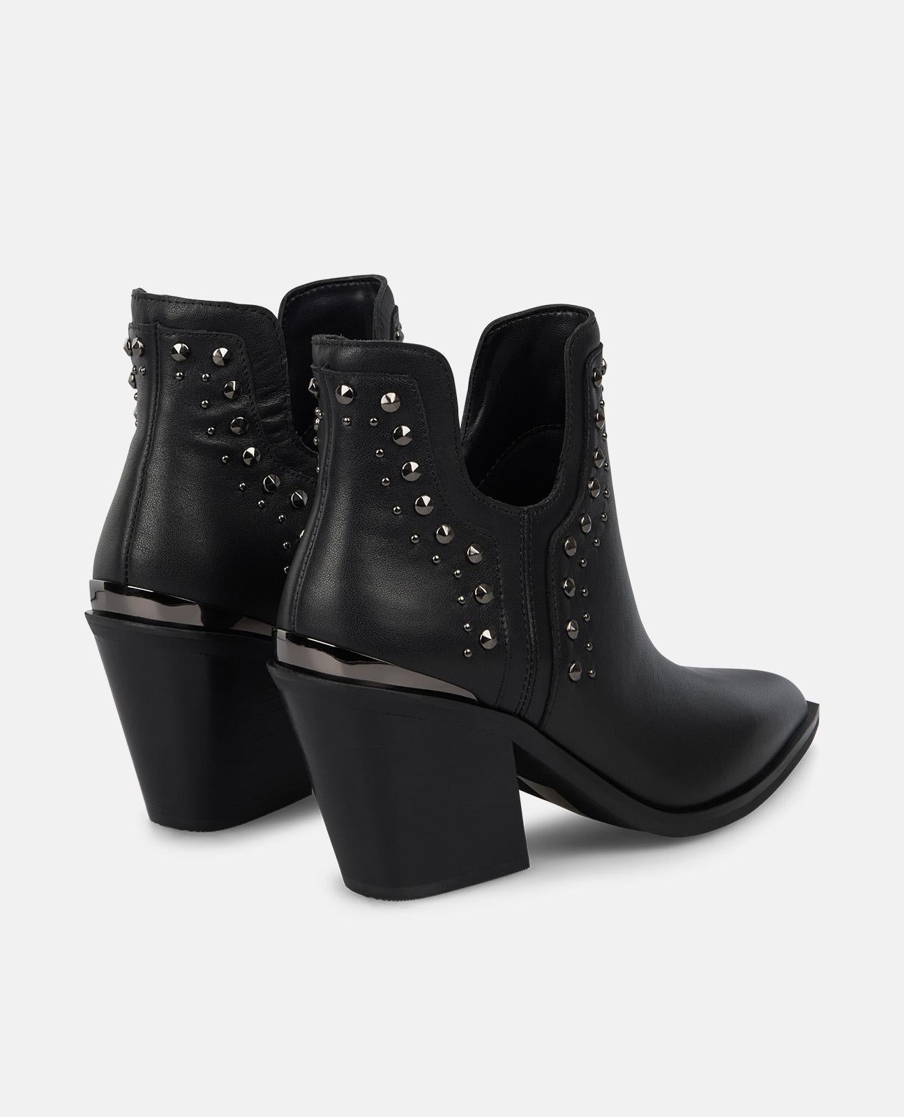 BOTÍN TACÓN ABERTURA TACHAS