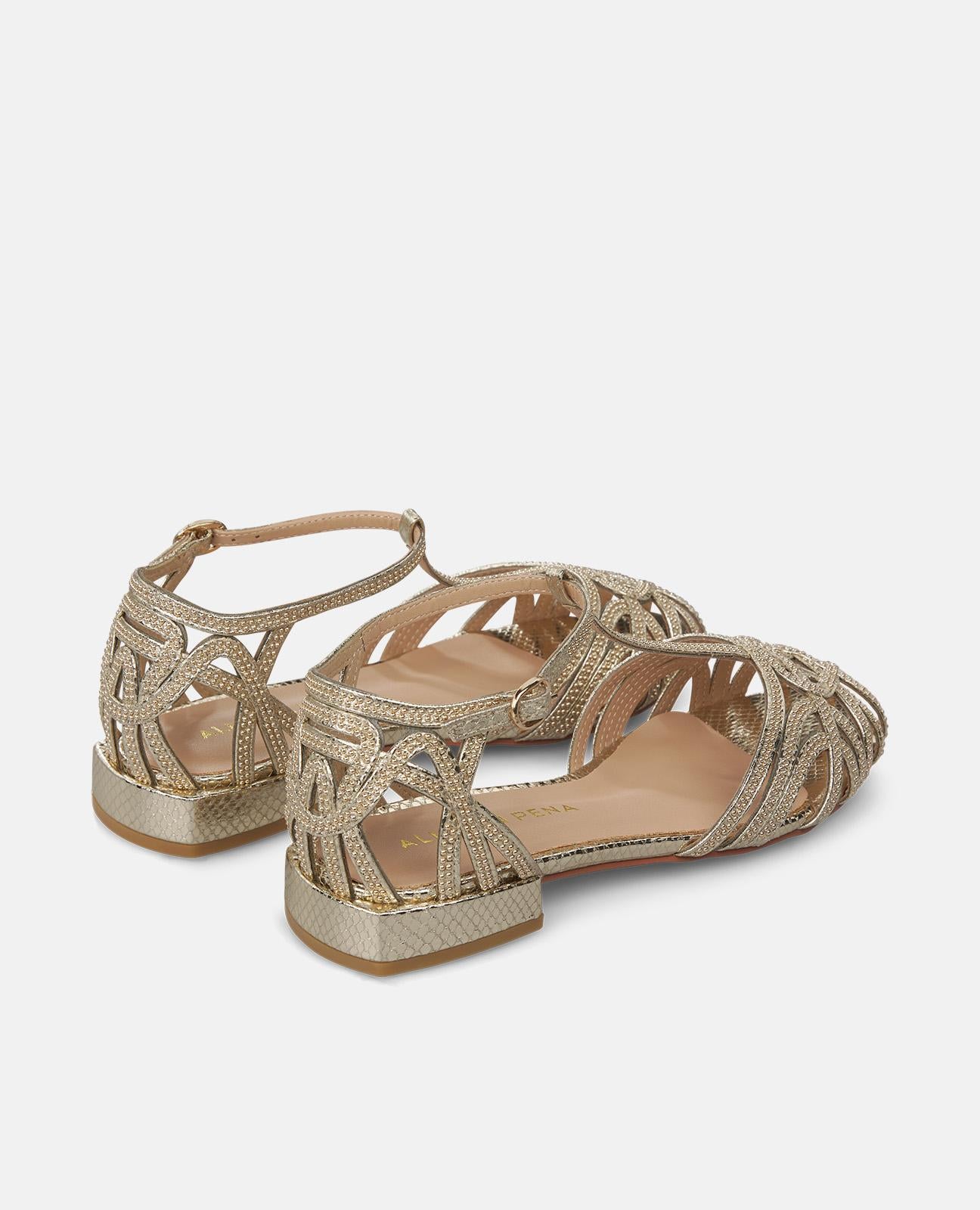 CLOGS WITH RHINESTONE DETAILS