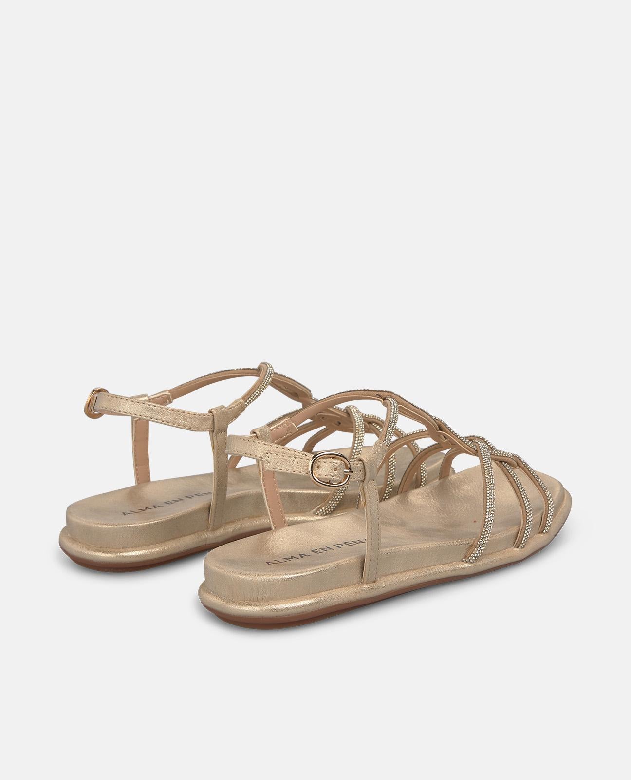 SANDALIA PLANA CON TIRAS METALICAS