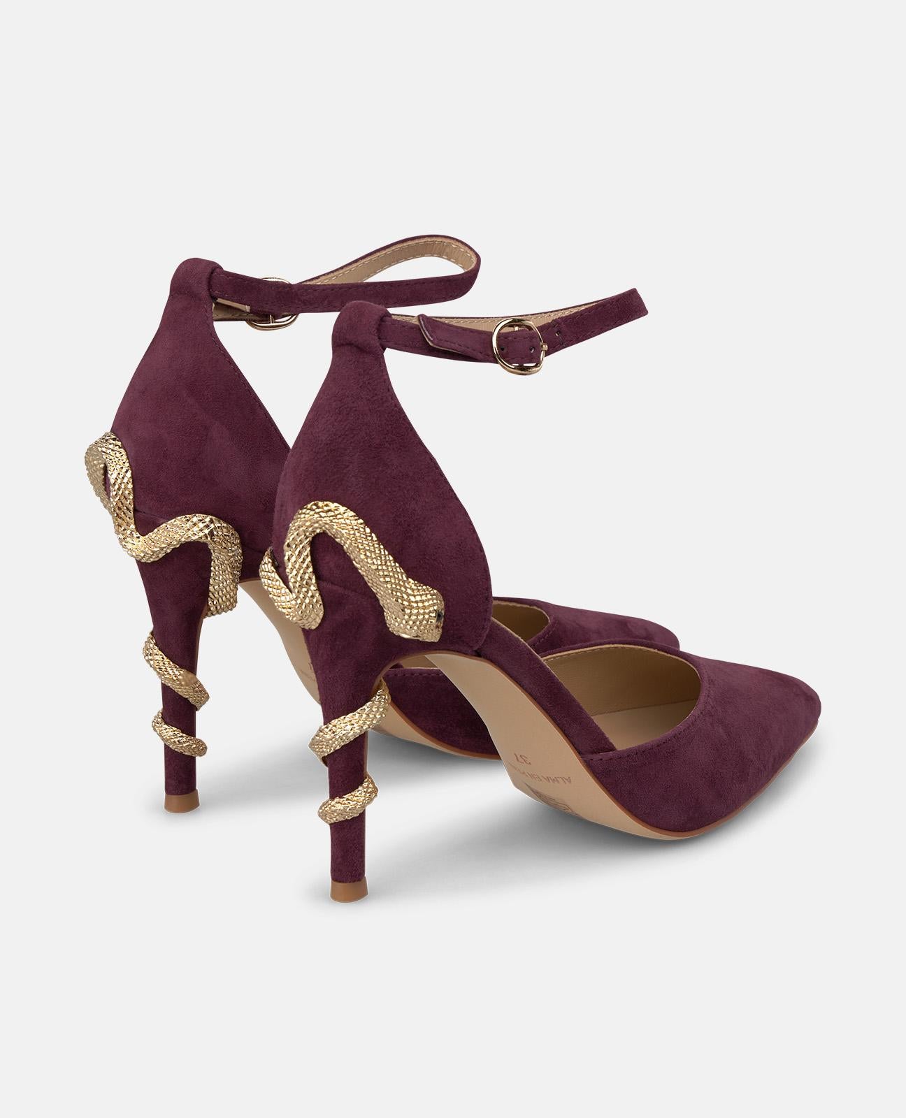 SHOE WITH SNAKE HEEL