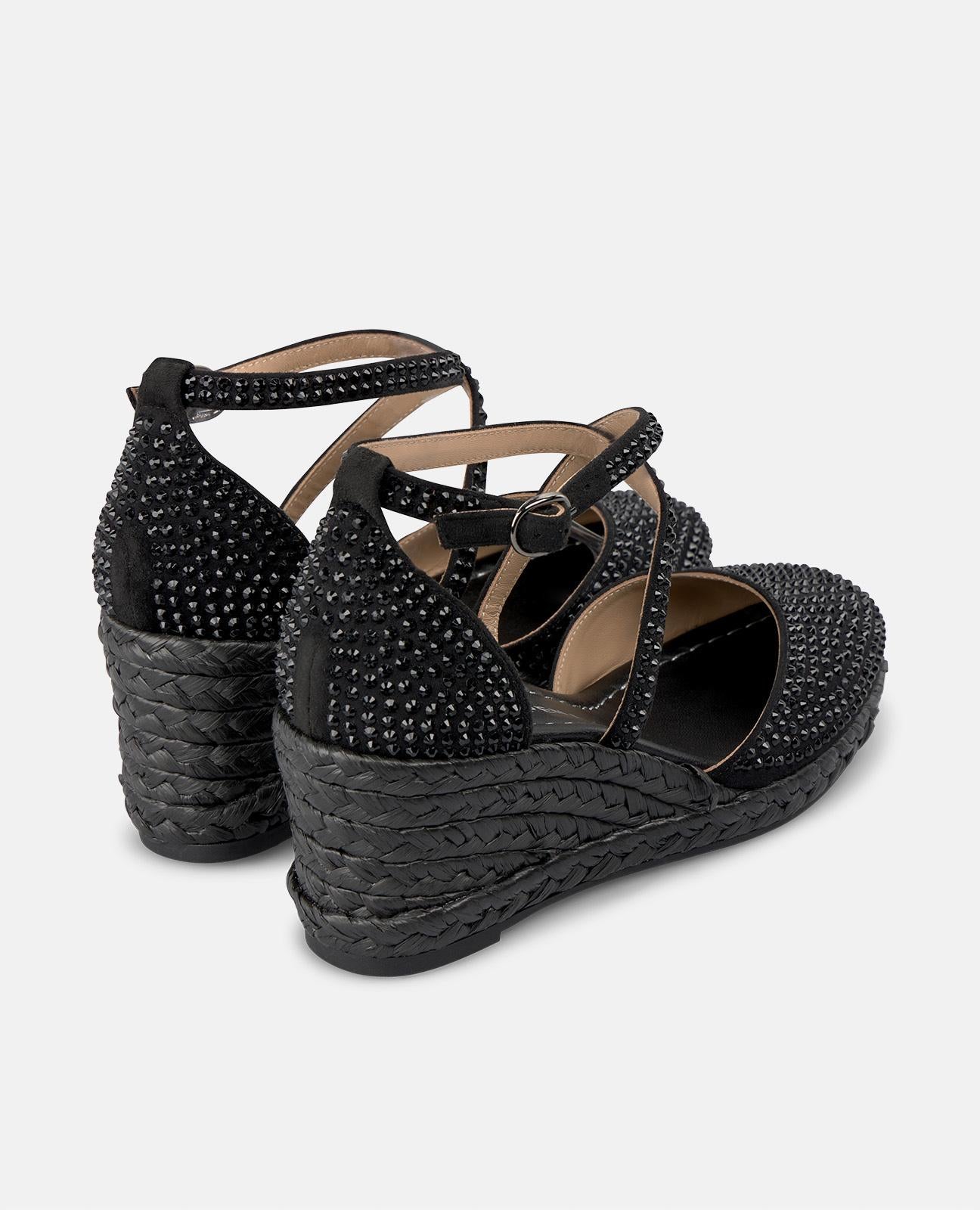 CUÑA CUBIERTA DE BRILLOS