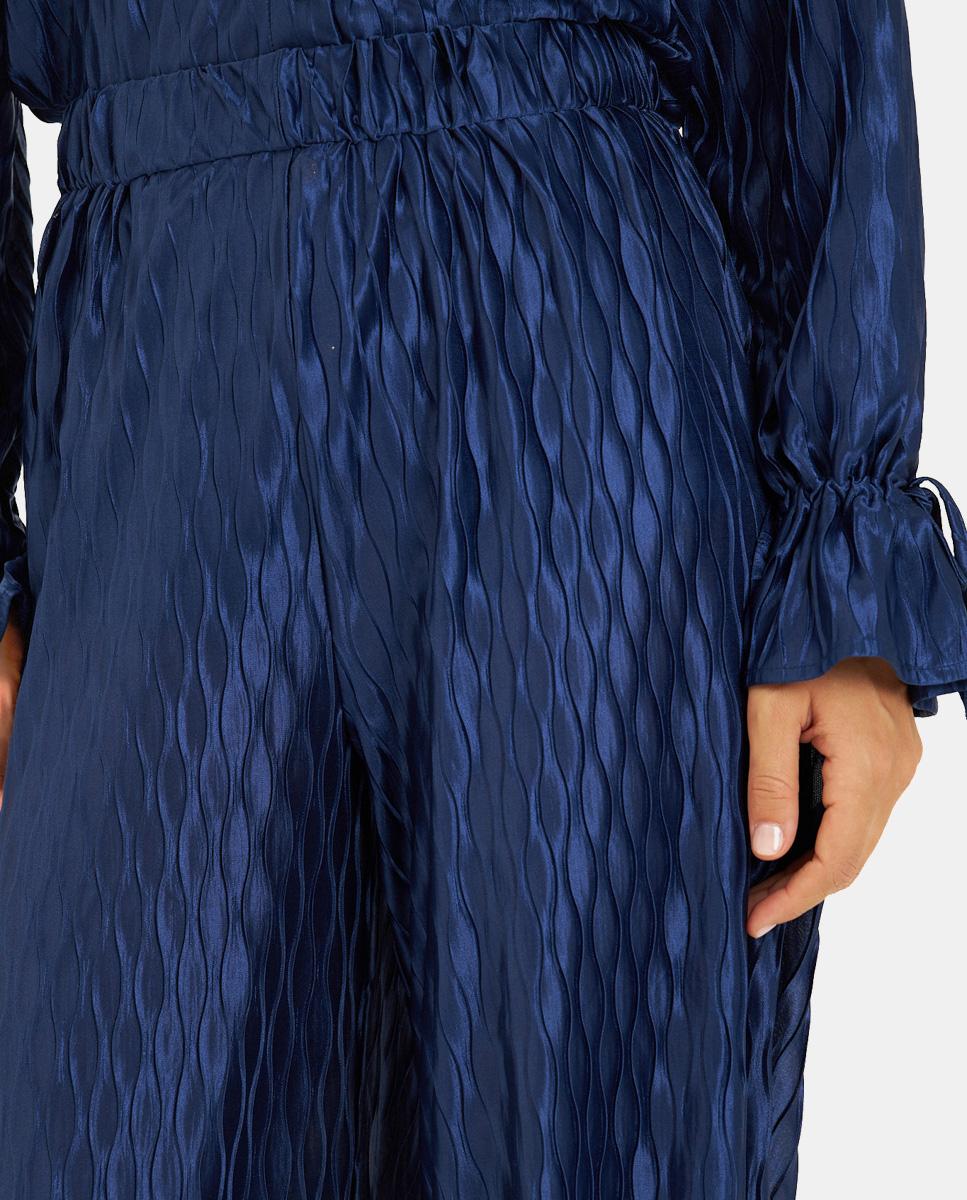 CALÇAS FLUIDAS TEXTURADAS