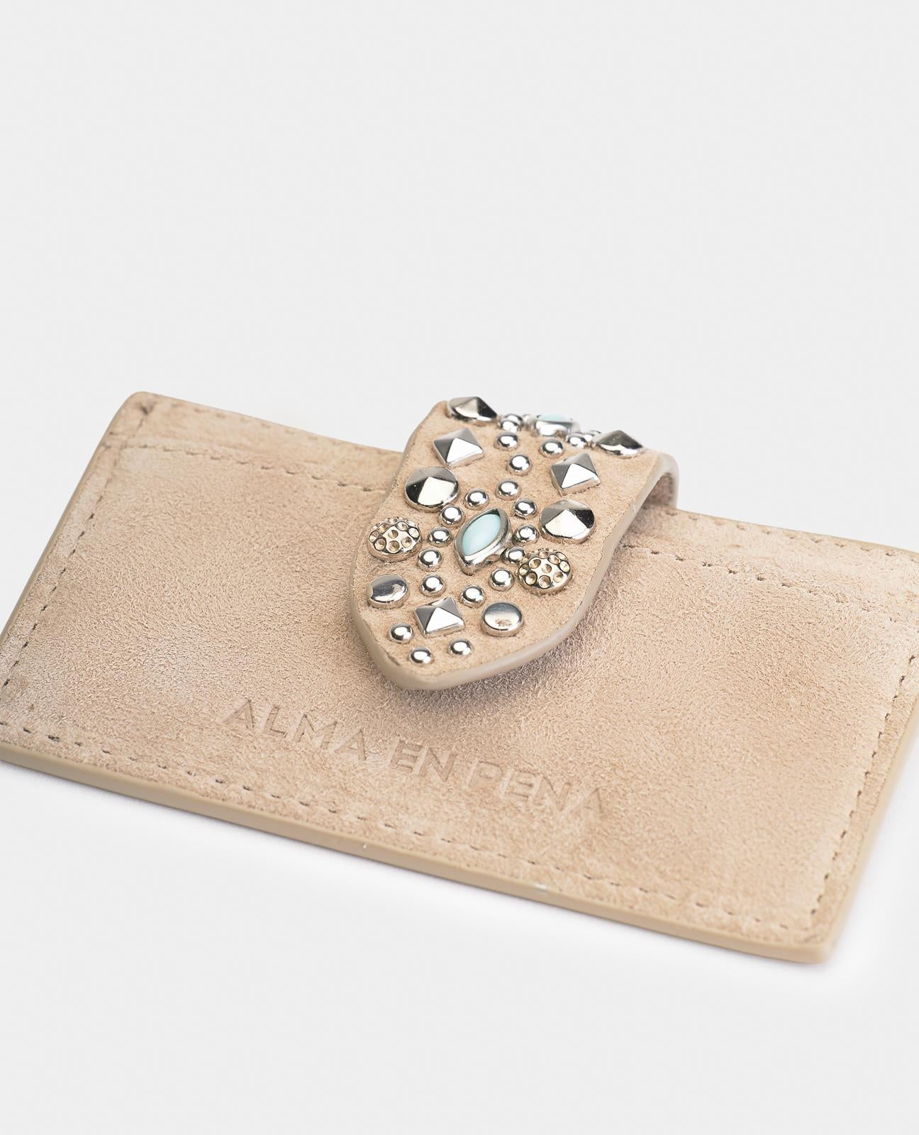 CARTERA SOLAPA TACHAS