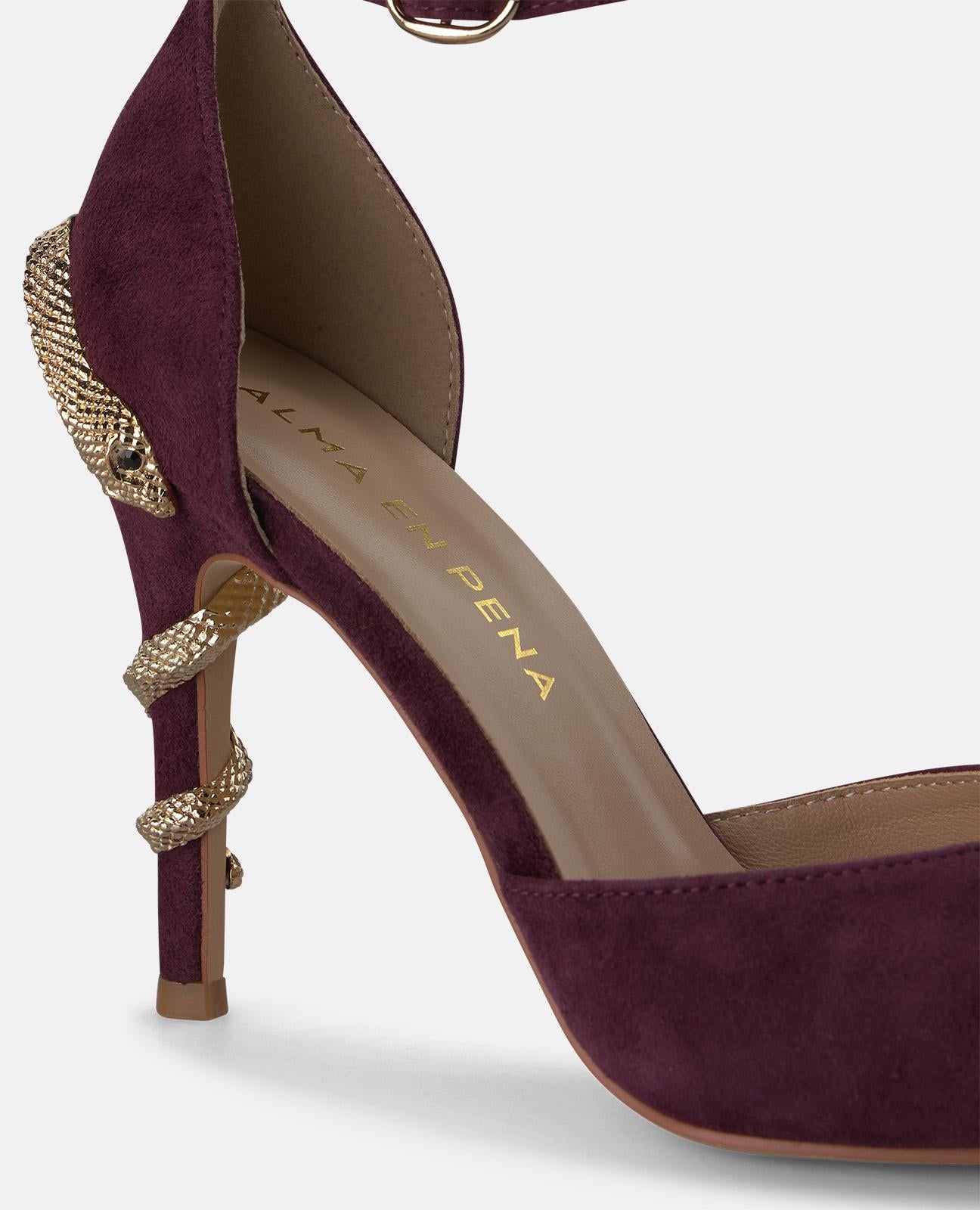 SHOE WITH SNAKE HEEL