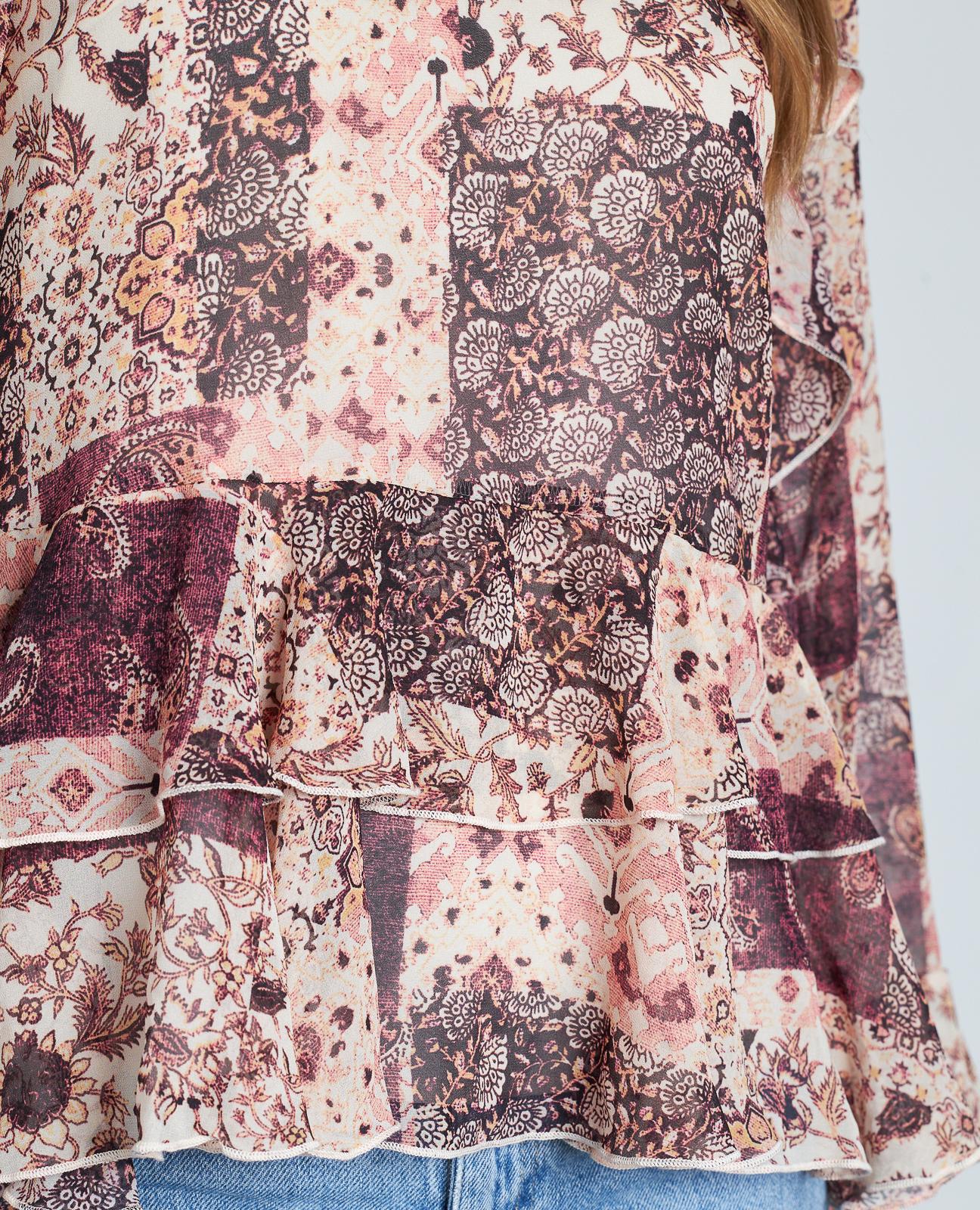 BLUSA ESTAMPADA VOLANTES