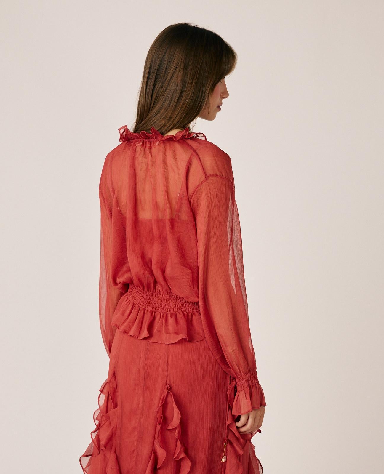 BLUSA DE GASA SEMITRANSPARENTE