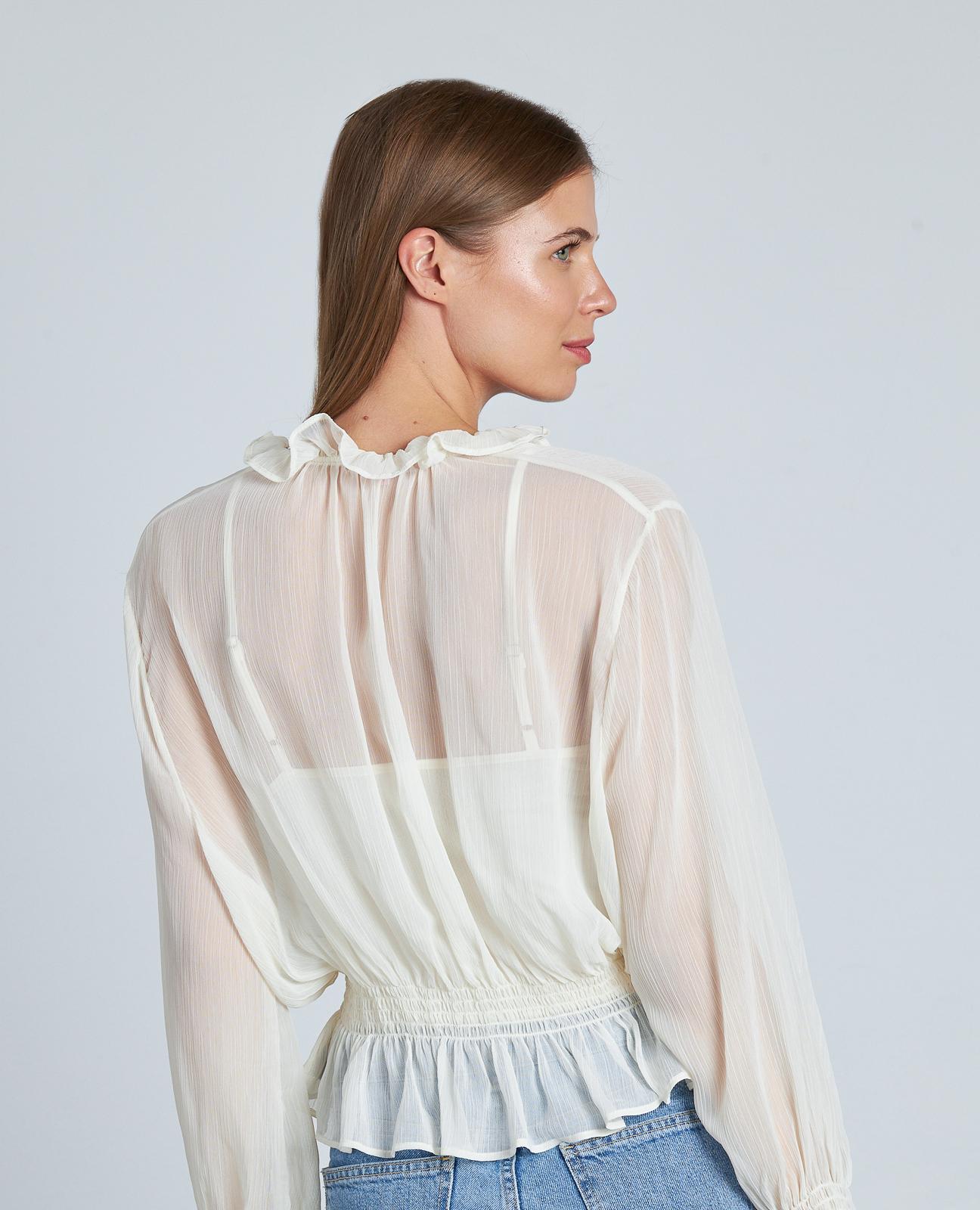 BLUSA SEMITRANSPARENTE VOLANTES