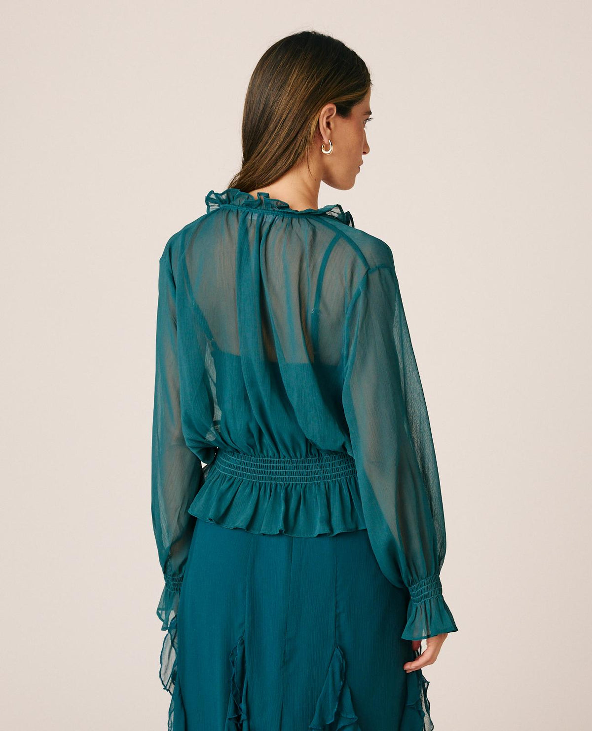 BLUSA SEMITRANSPARENTE VOLANTES