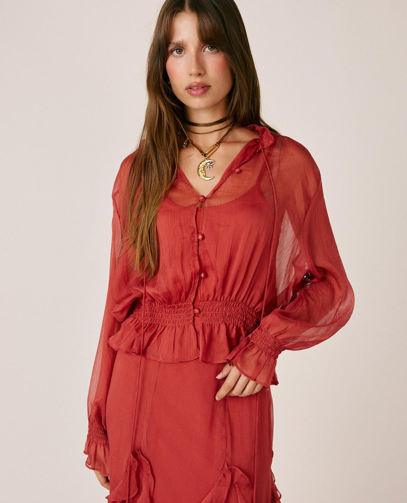 BLUSA DE GASA SEMITRANSPARENTE