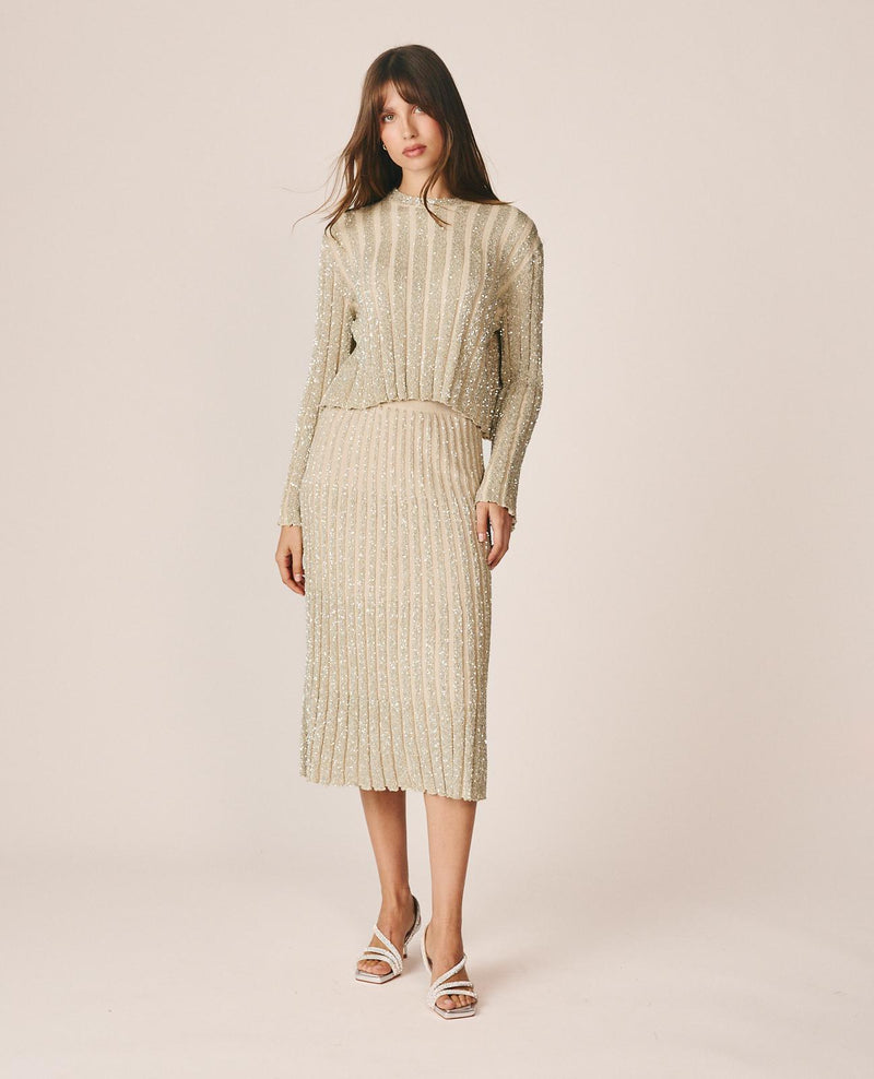FALDA MIDI CANALÉ CON LENTEJUELAS