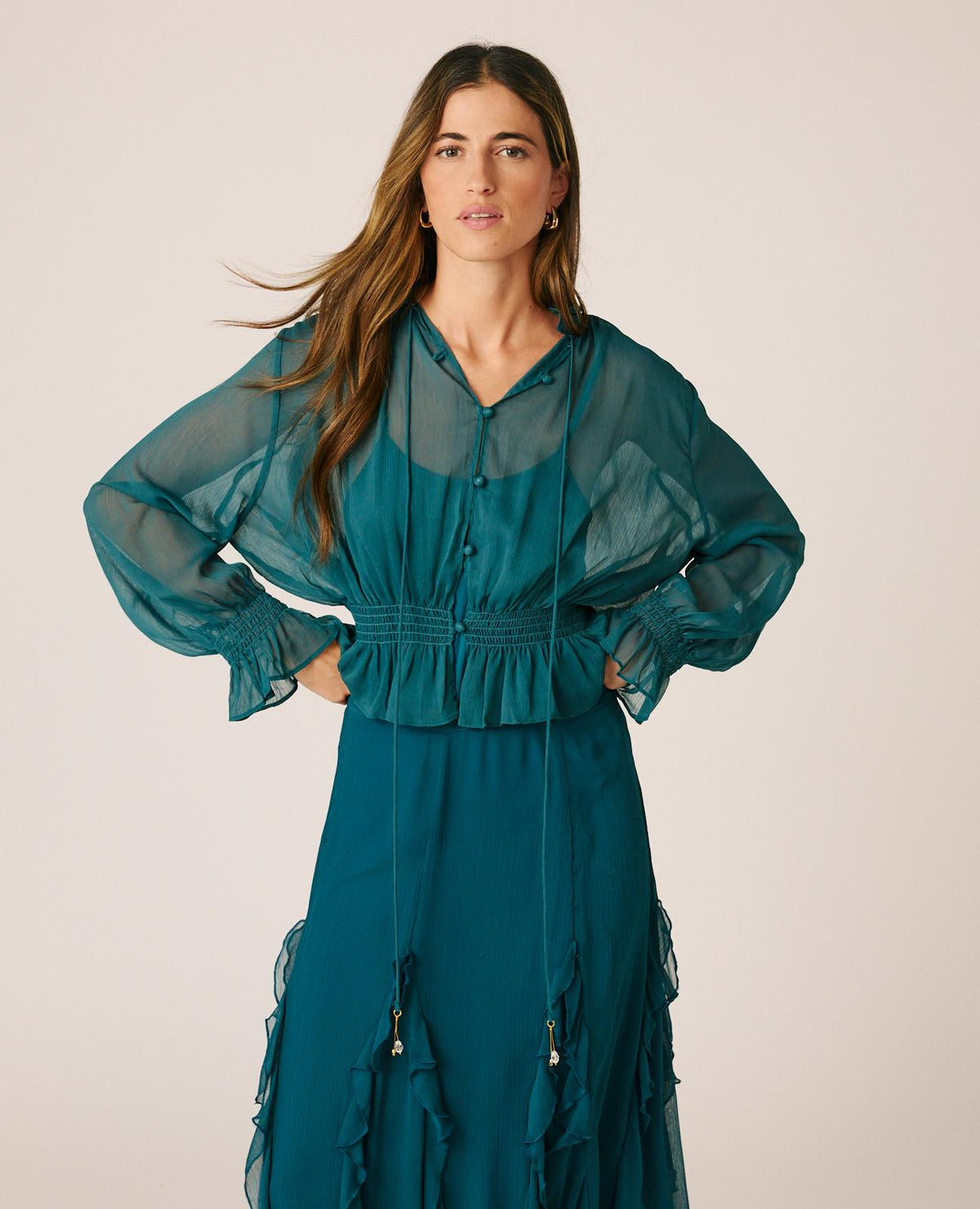 BLUSA SEMITRANSPARENTE VOLANTES