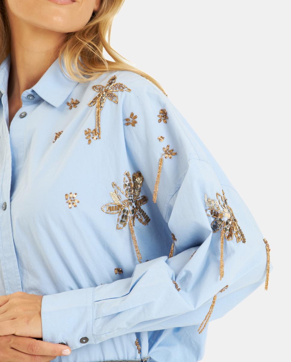 CAMISA CON PEDRERÍA COLGANTE