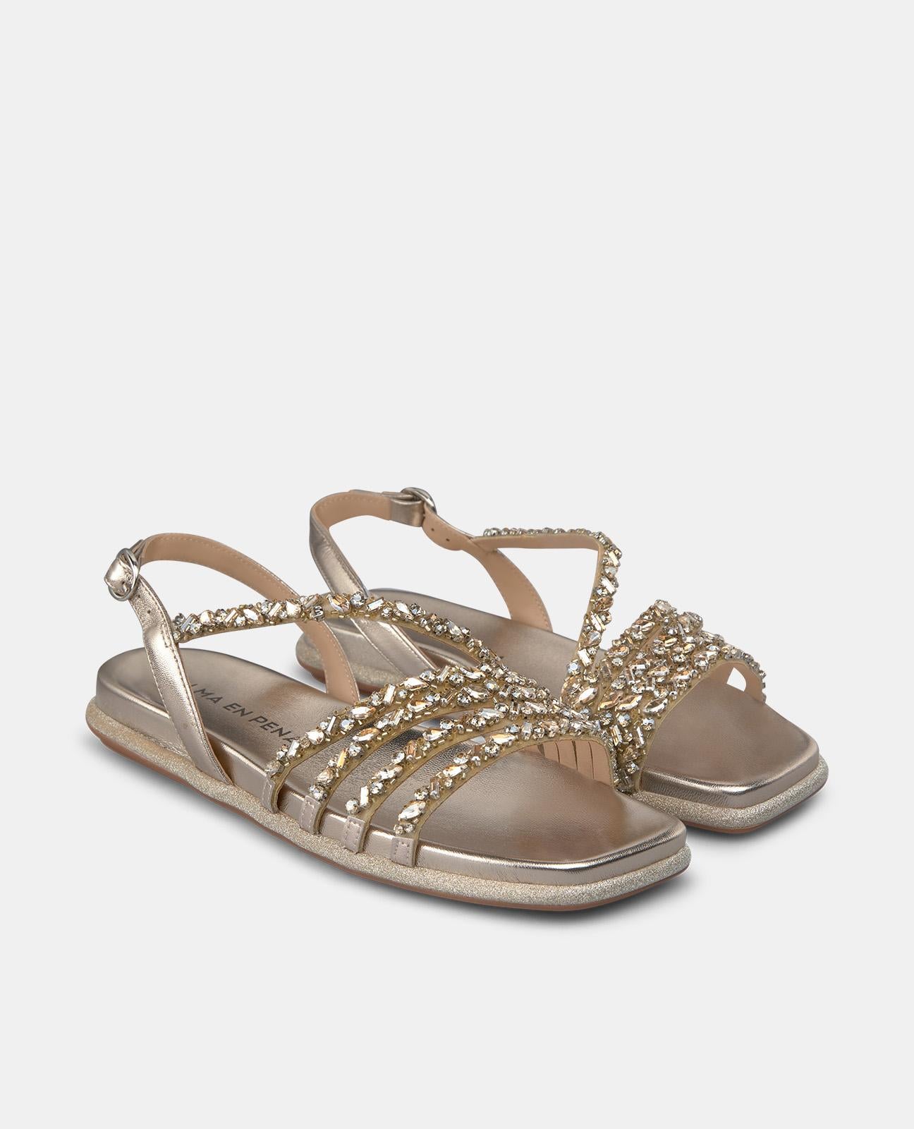 FLAT SANDAL WITH CROSSED RHINESTONES