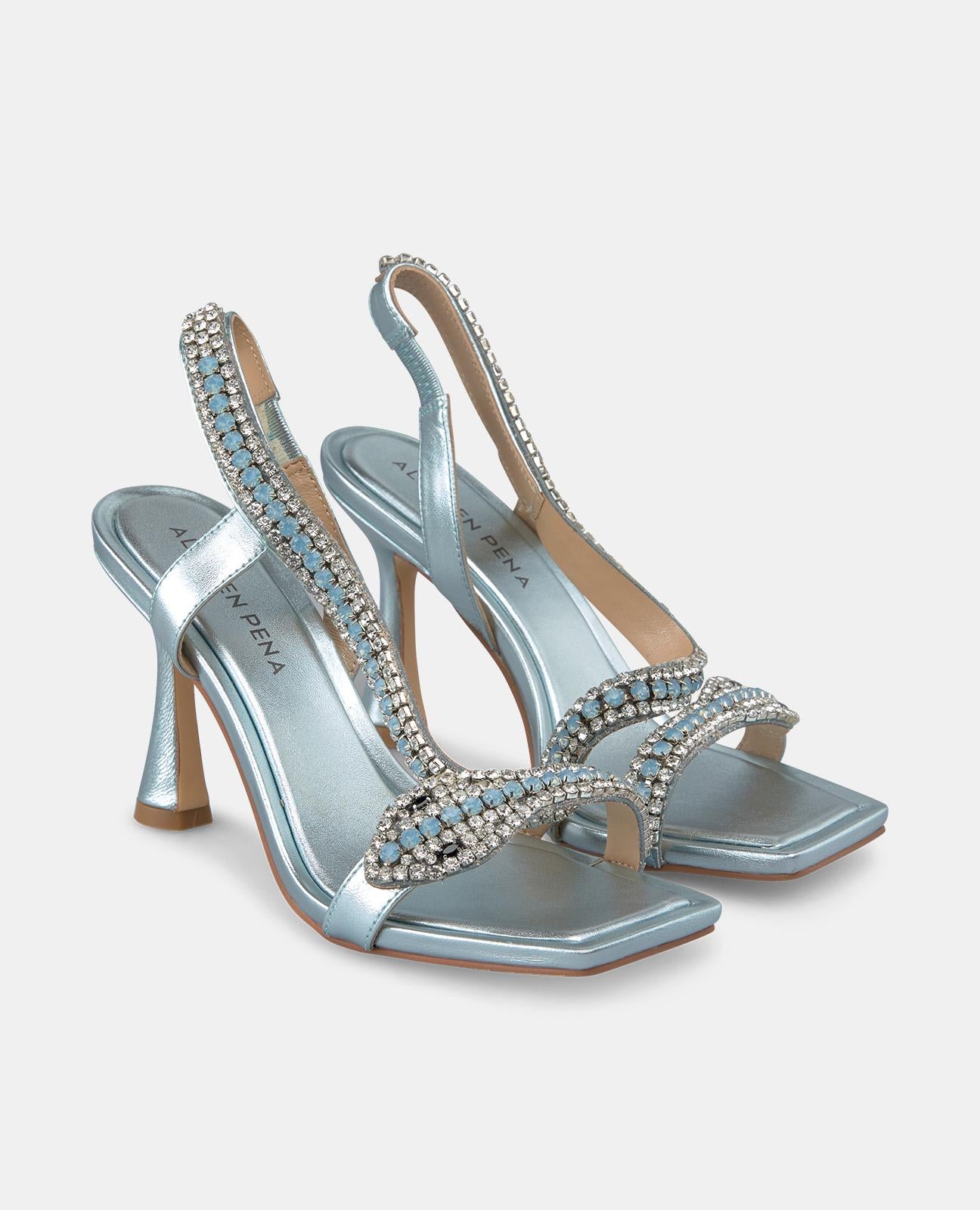 CIRCULAR HEEL SNAKE SANDAL