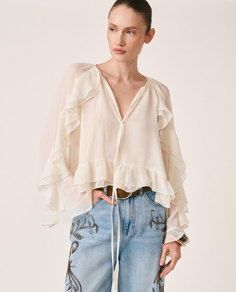 BLUSA COM MANGAS COM BABADOS