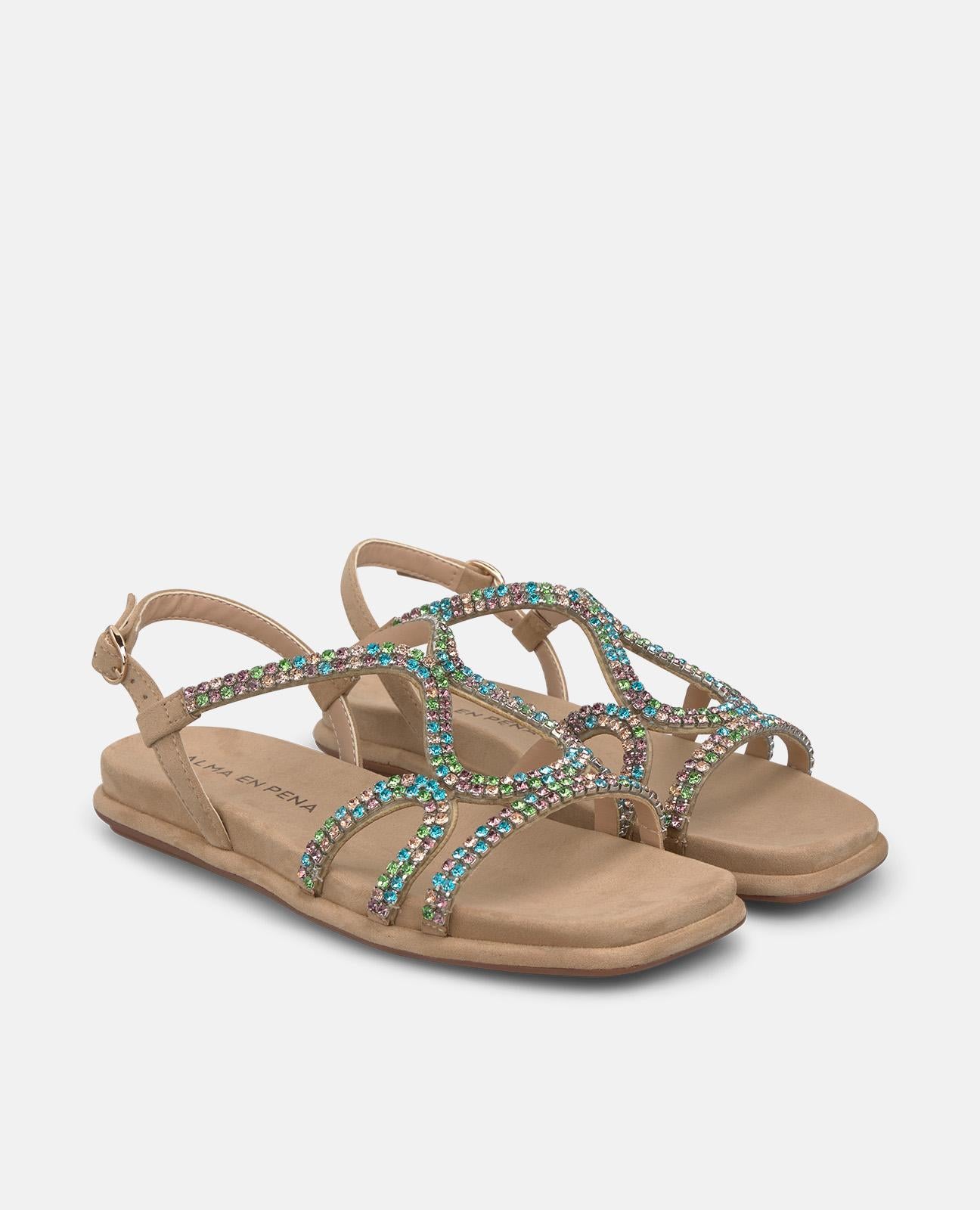 SANDALIA PLANA ENTRELAZADA TACHUELAS