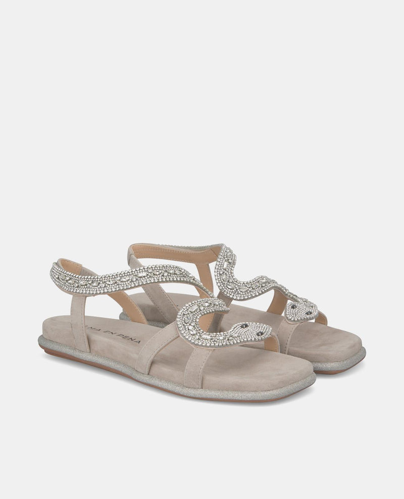 SANDALIA SERPIENTE SUELA PURPURINA