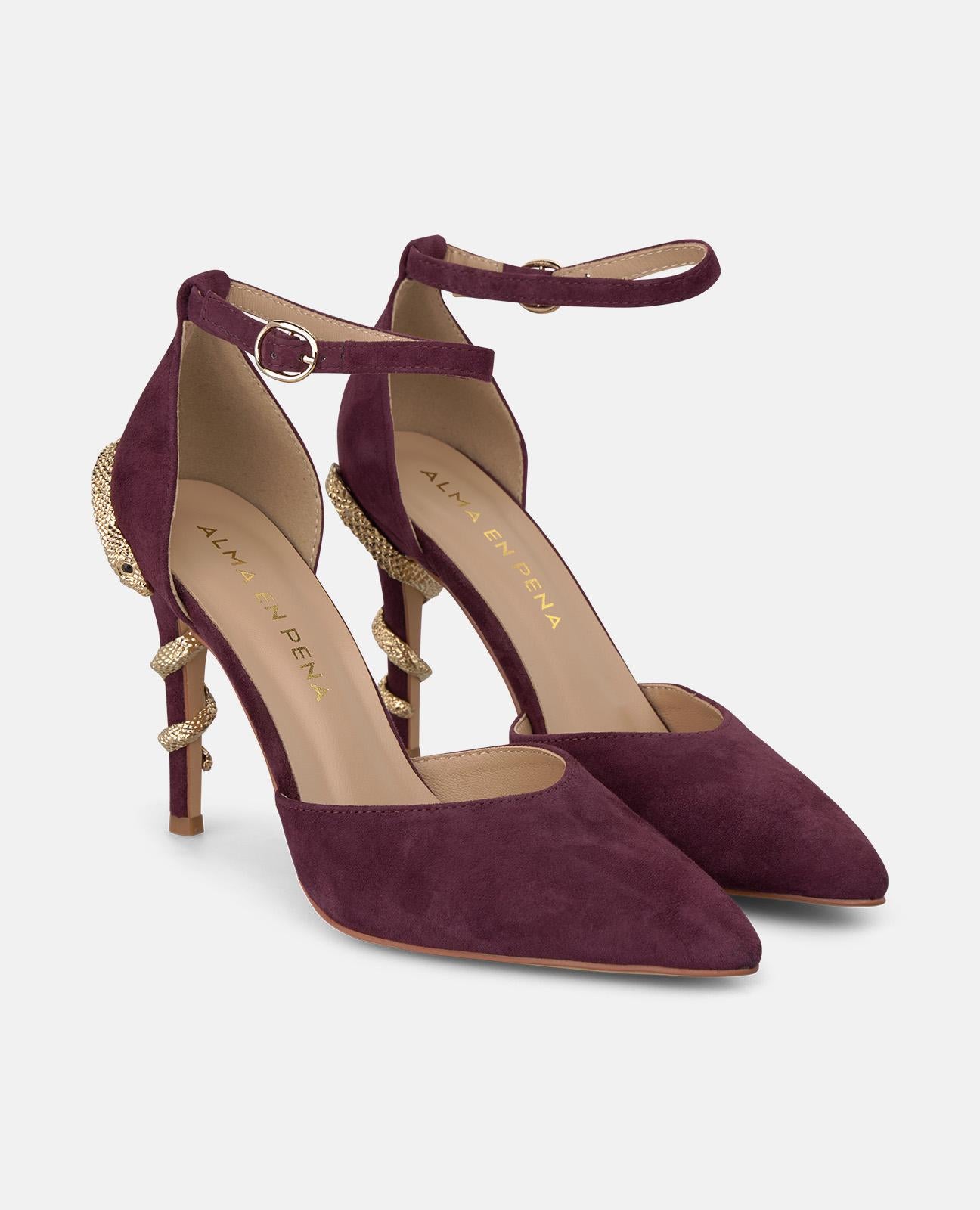 SHOE WITH SNAKE HEEL