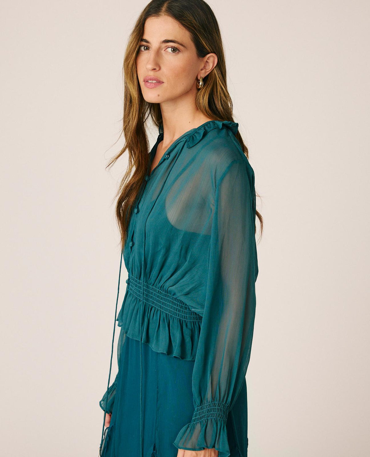 BLUSA SEMITRANSPARENTE VOLANTES