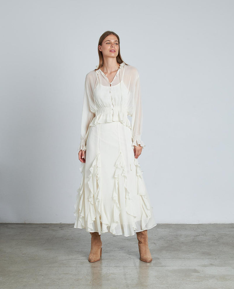 BLUSA SEMITRANSPARENTE VOLANTES