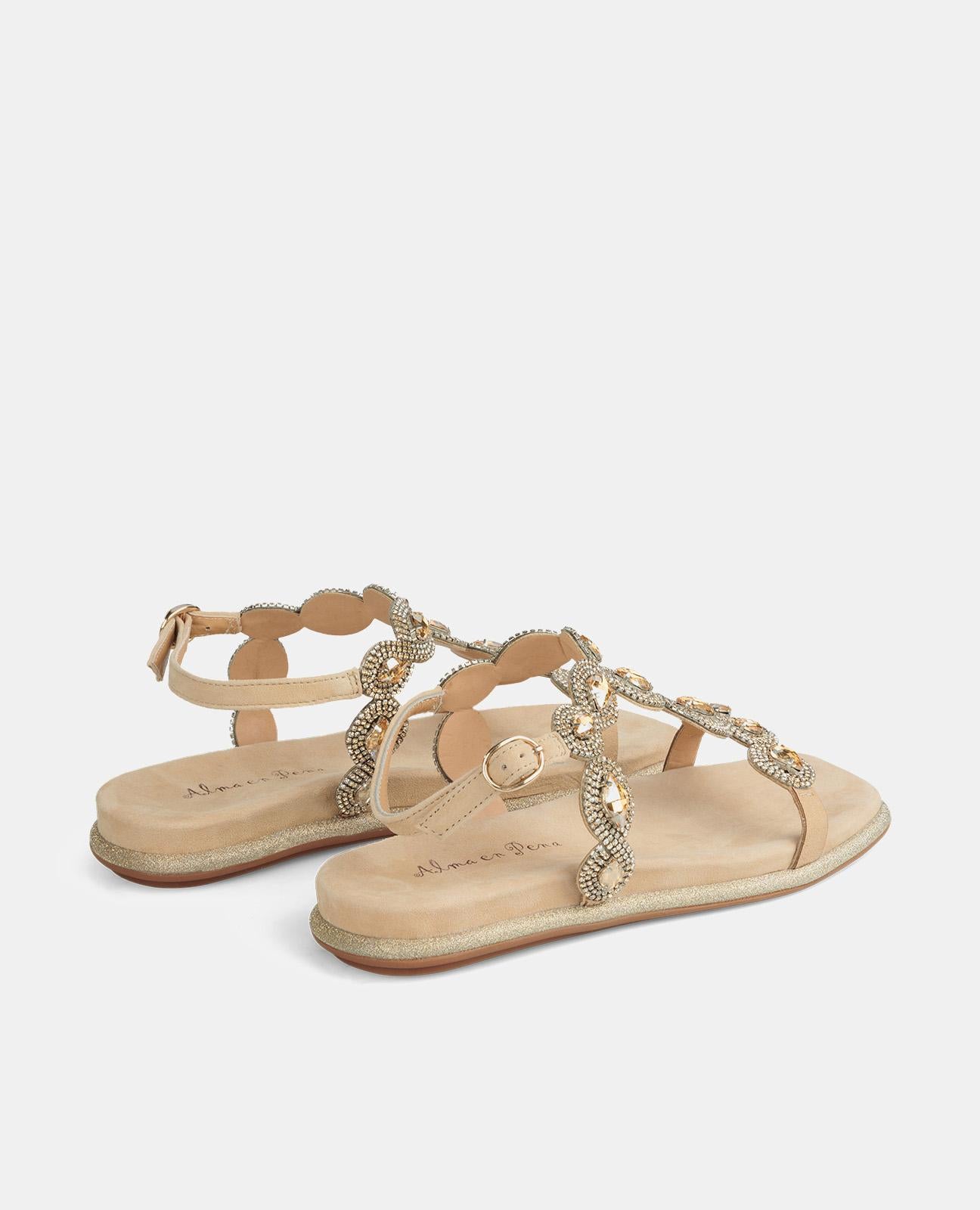 FLAT SANDAL WITH BUCKLE CLOSURE