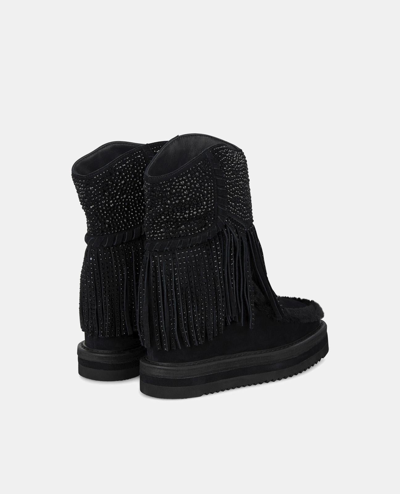 BOTTE DE CHEVILLE EN FOURRURE FRANGÉE