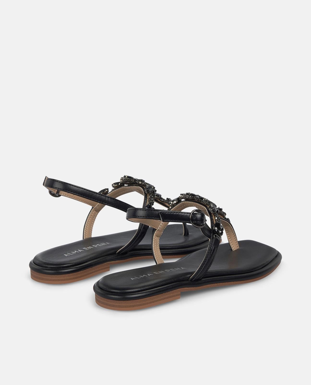 SANDALIA PLANA EN T TIRA EN PEDRERIA