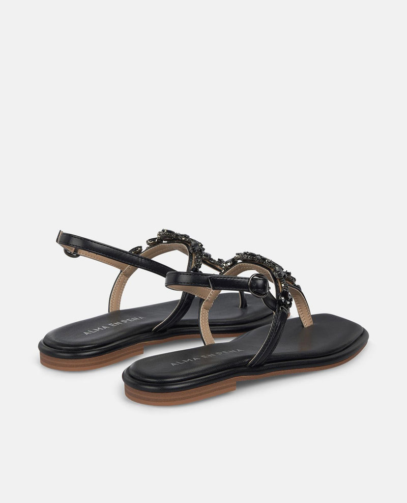 SANDALIA PLANA EN T TIRA EN PEDRERIA