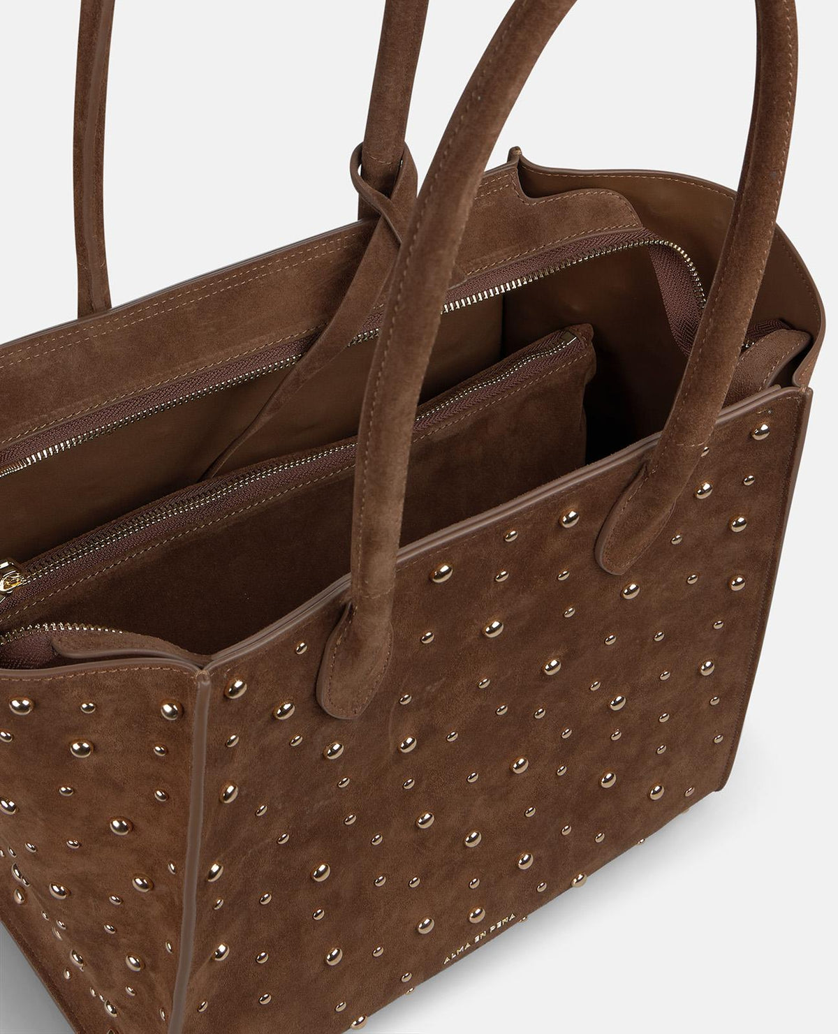 BORSA TOTE IN PELLE CON TACHI METALLICI
