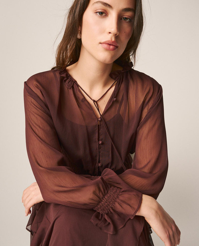 BLUSA SEMITRANSPARENTE VOLANTES