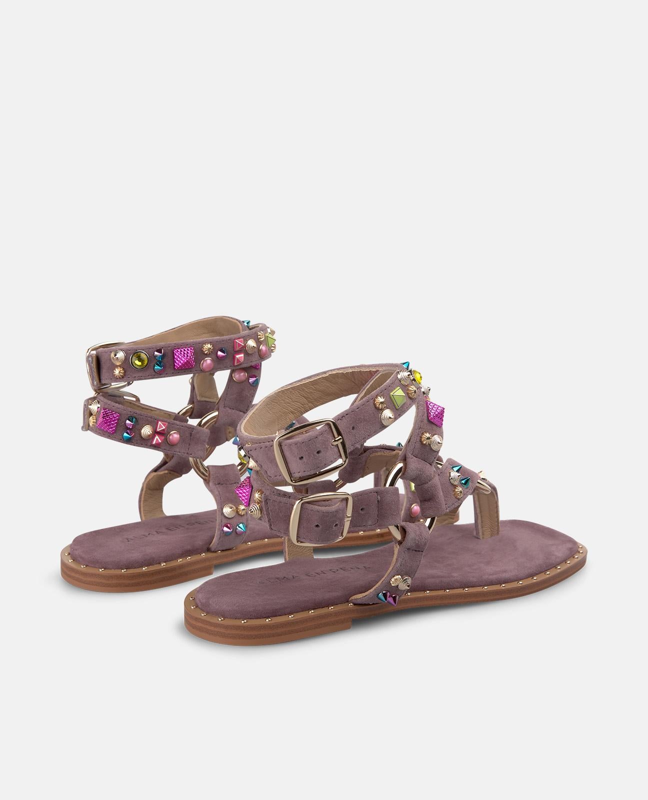 FLAT SANDAL WITH CIRCULAR BUCKLE