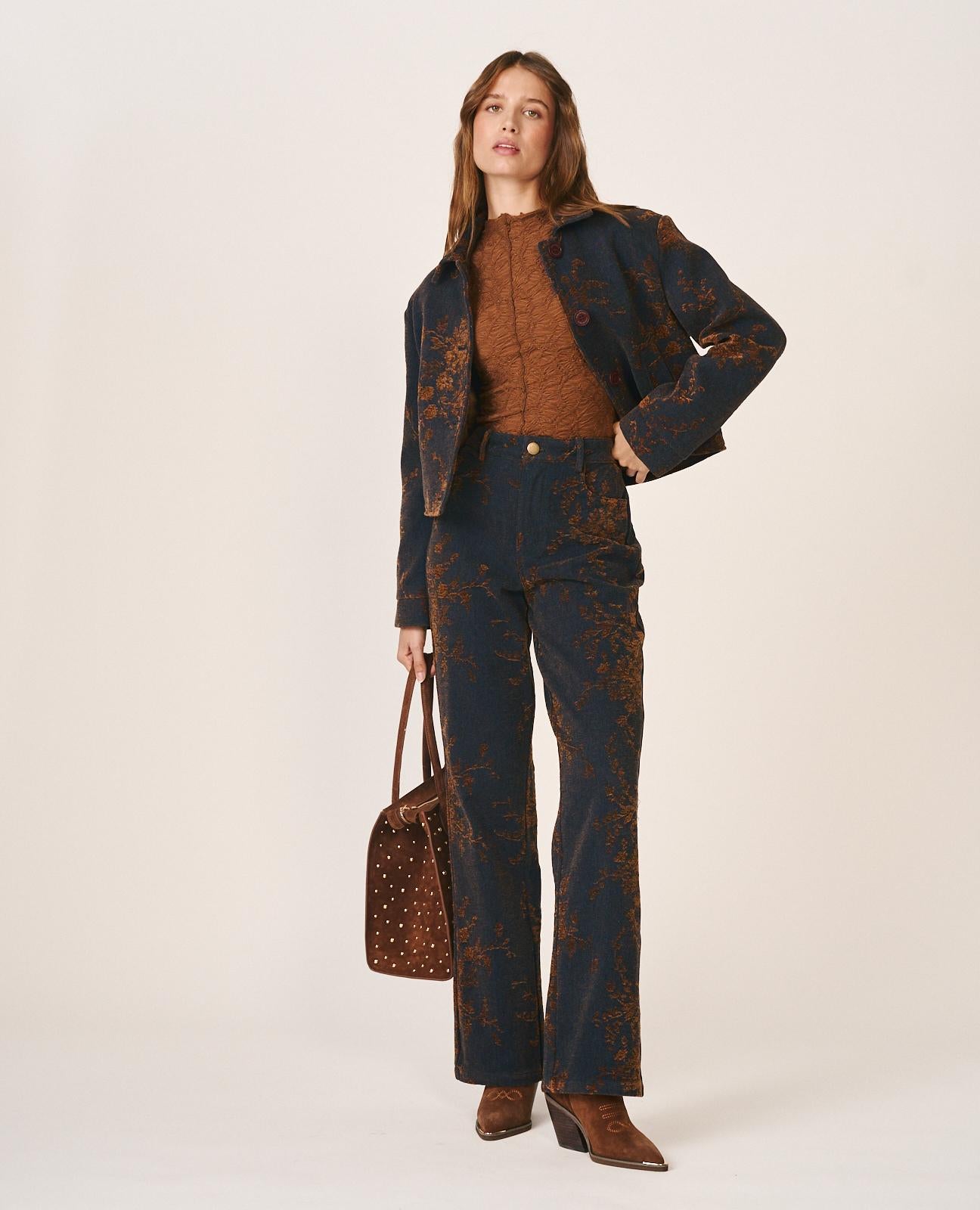 BOLSO TOTE PIEL CON TACHAS METÁLICAS