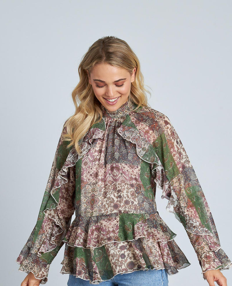 BLUSA ESTAMPADA VOLANTES