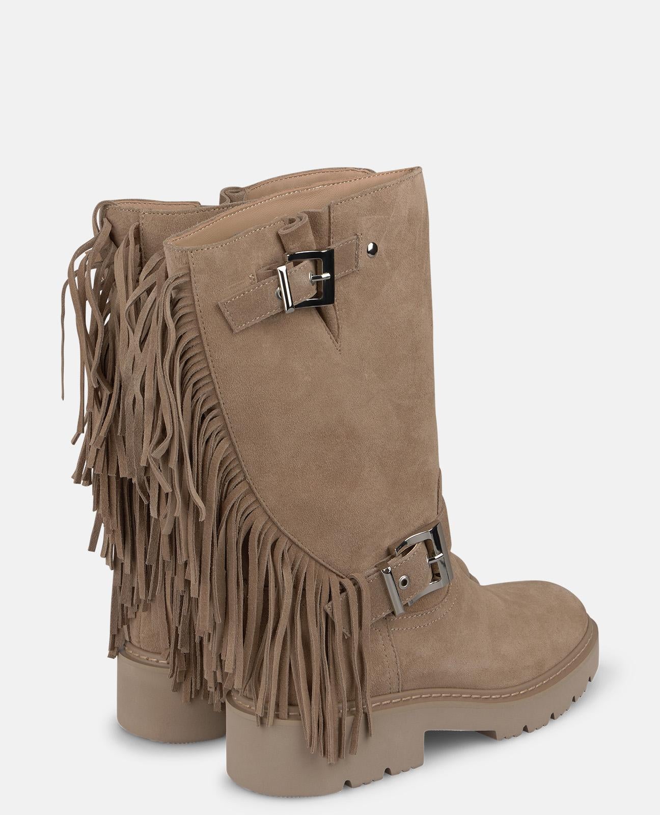 BOTA DE PIEL CON FLECOS