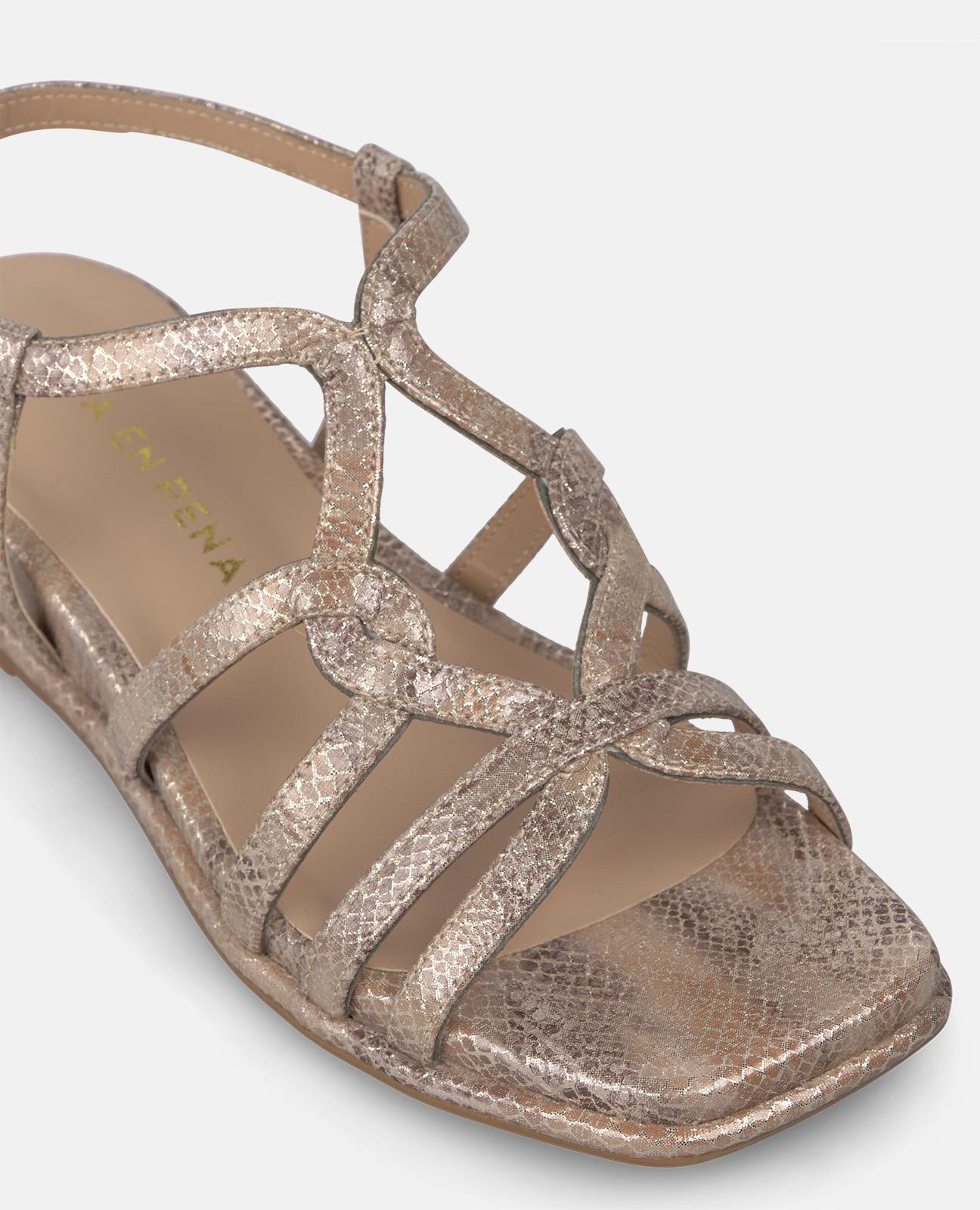 SANDALIA DE CUÑA BAJA CON TIRAS ENTRELAZADAS