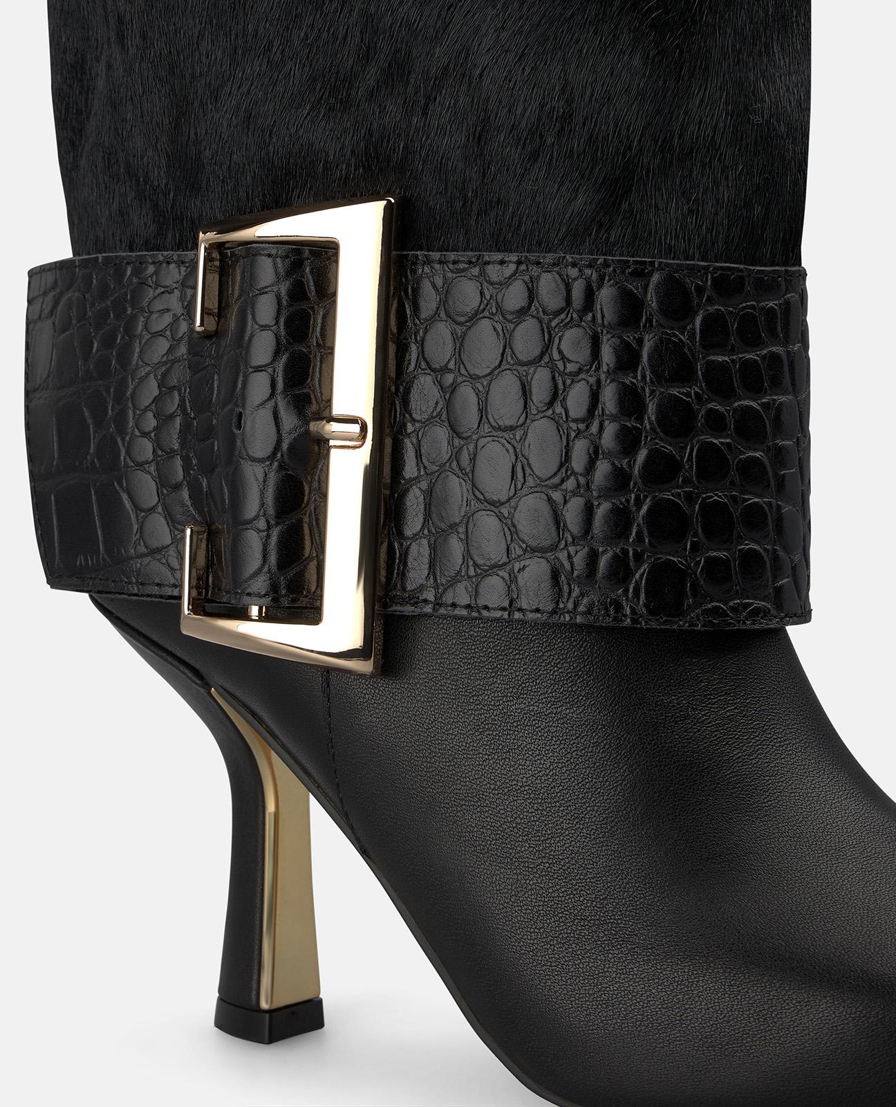 BOTA DE PIEL CON TACÓN
