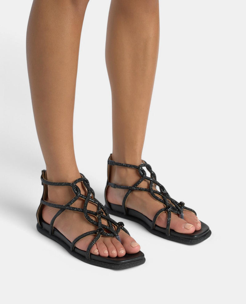 SANDALIA PLANA TIRAS ENREDADAS