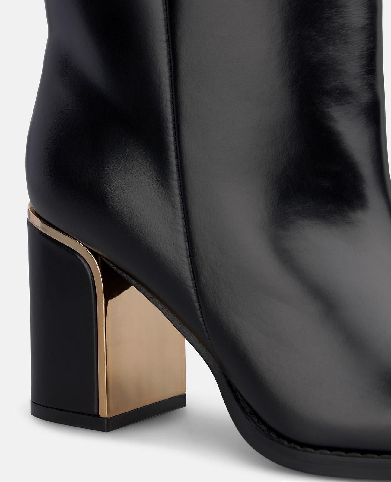 BOTA DE PIEL CON TACÓN