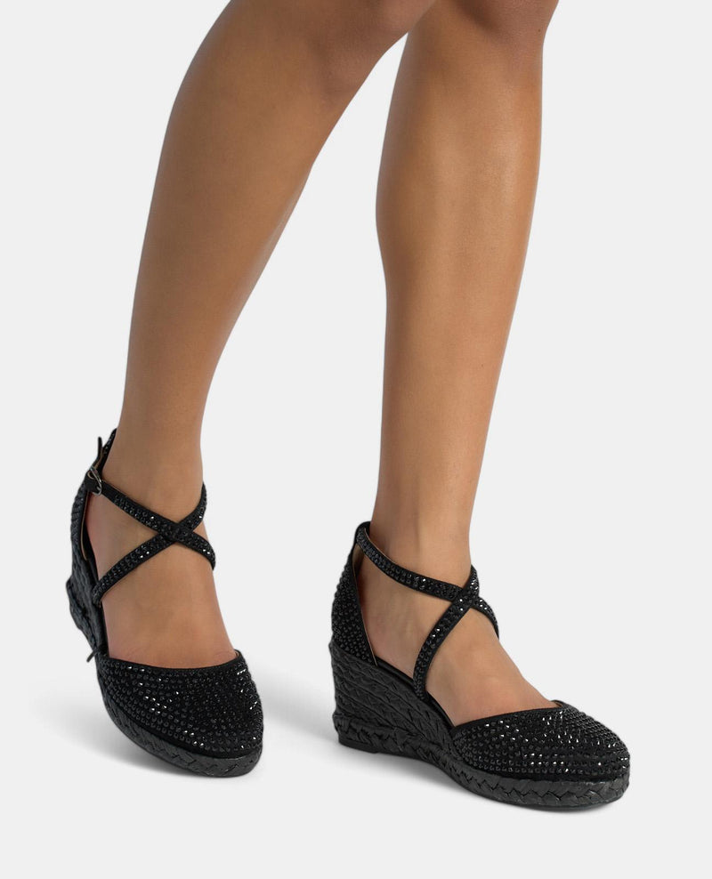 CUÑA CUBIERTA DE BRILLOS